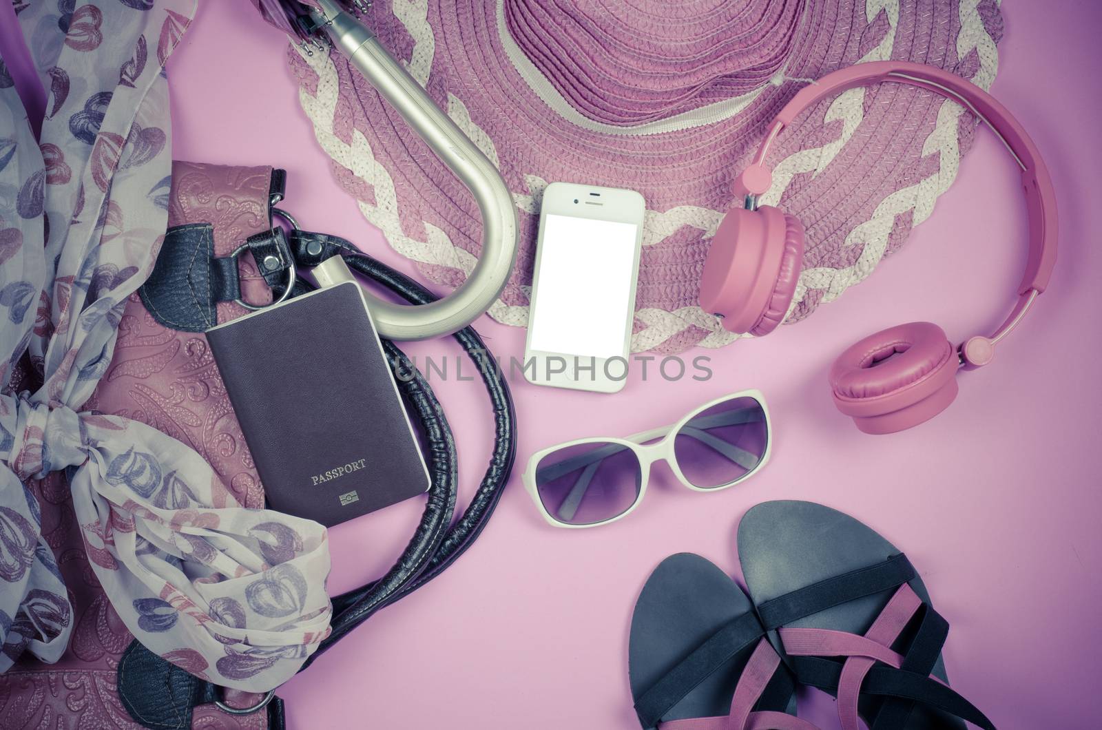 Travel accessories, bags, scarves, umbrellas, wallets headphones. Vodafone Passport smart shoes ready for the trip.