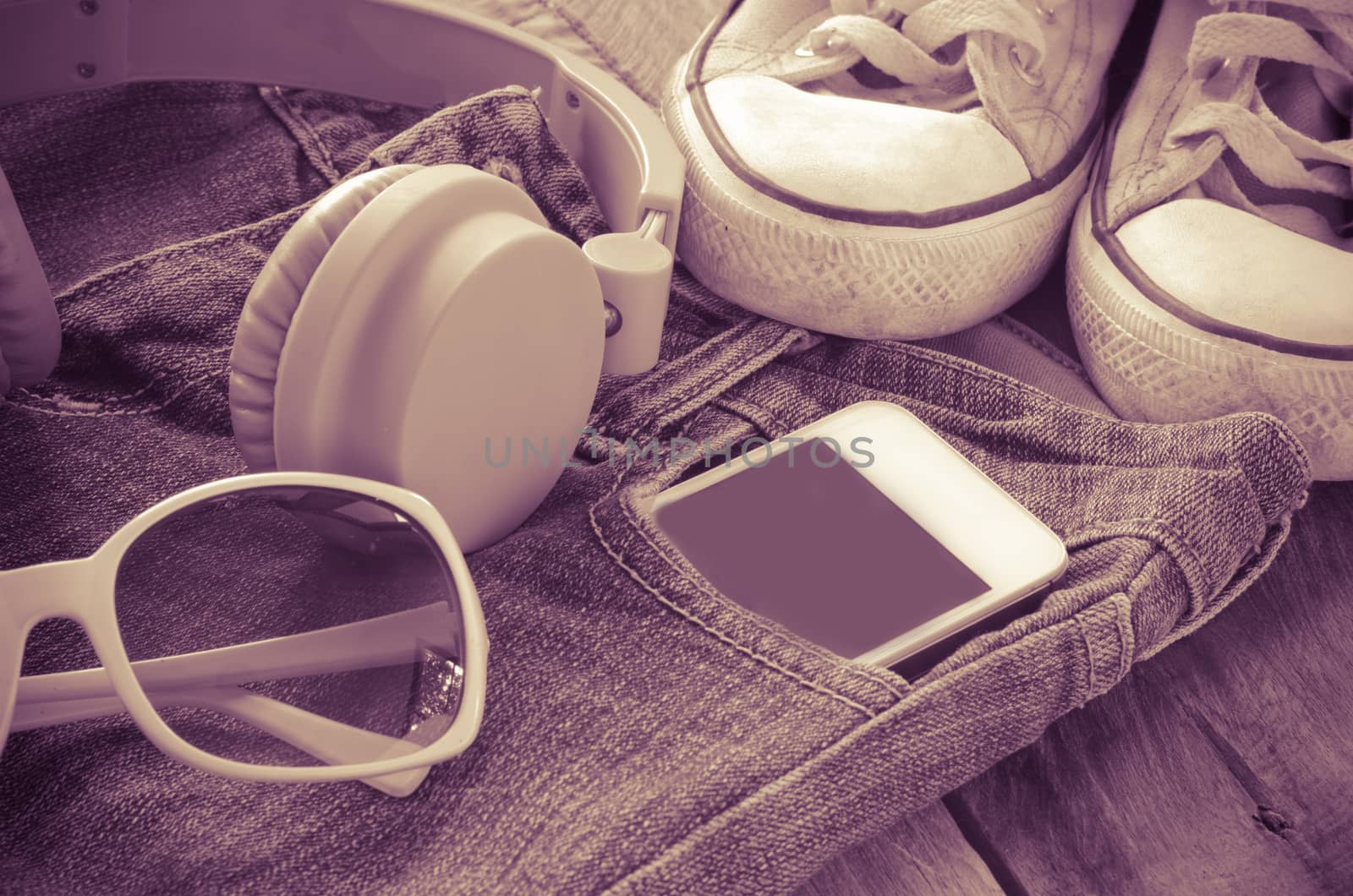 accessory jeans smart devices, glasses on a wooden floor tone vintage
