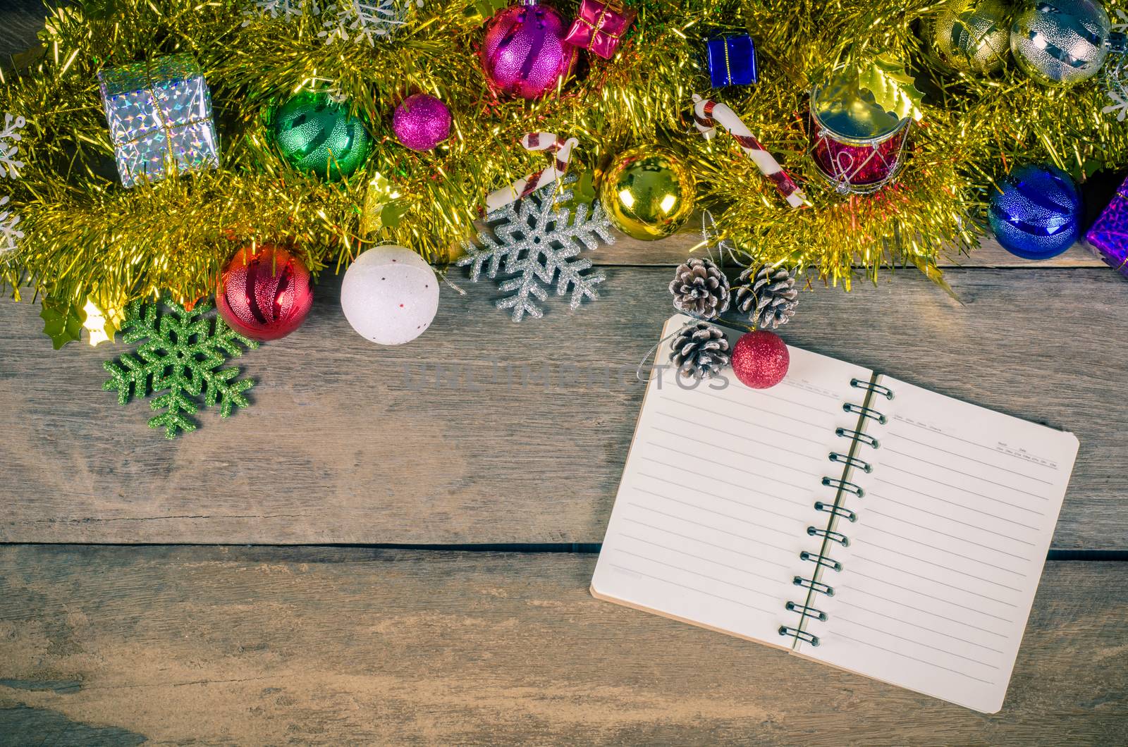 notebooks and Christmas background on wood - tone vintage