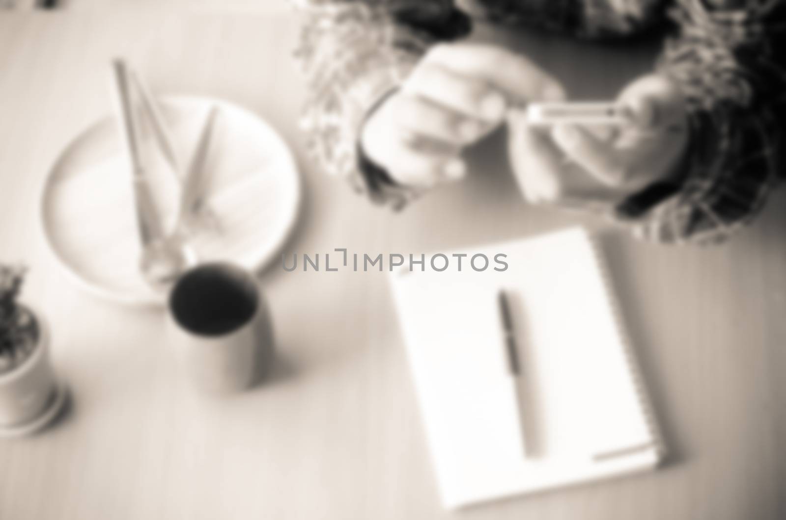 Blur image a man working from home using smart phone