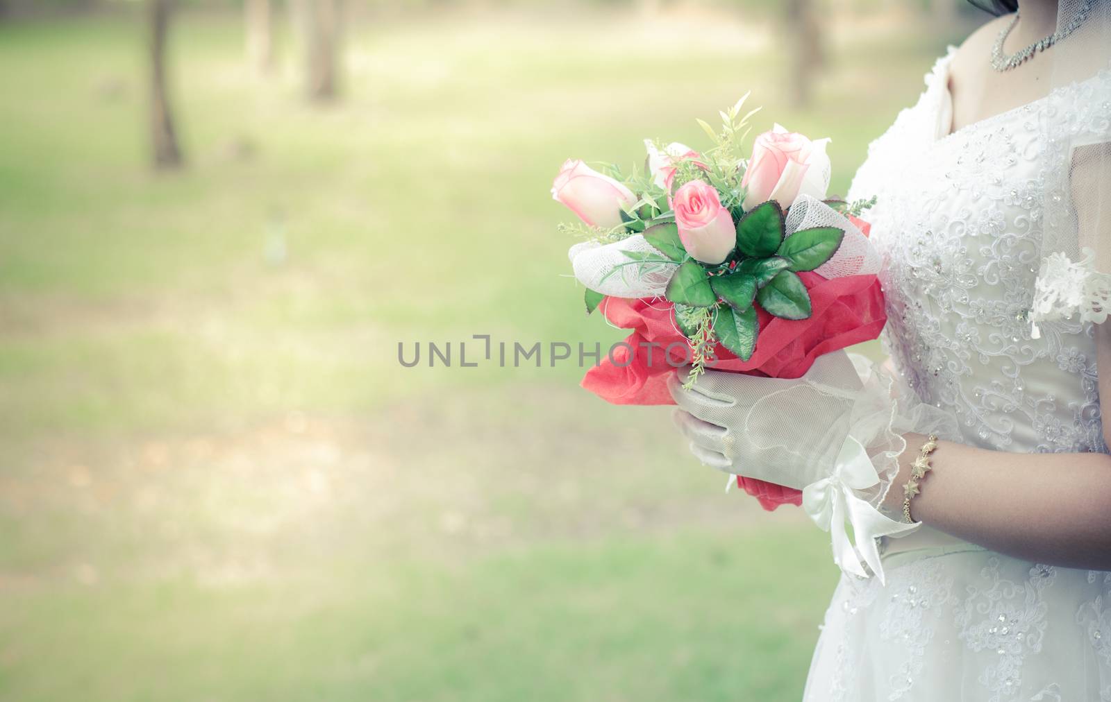 Beautiful bouquet of flowers in hand the bride.
