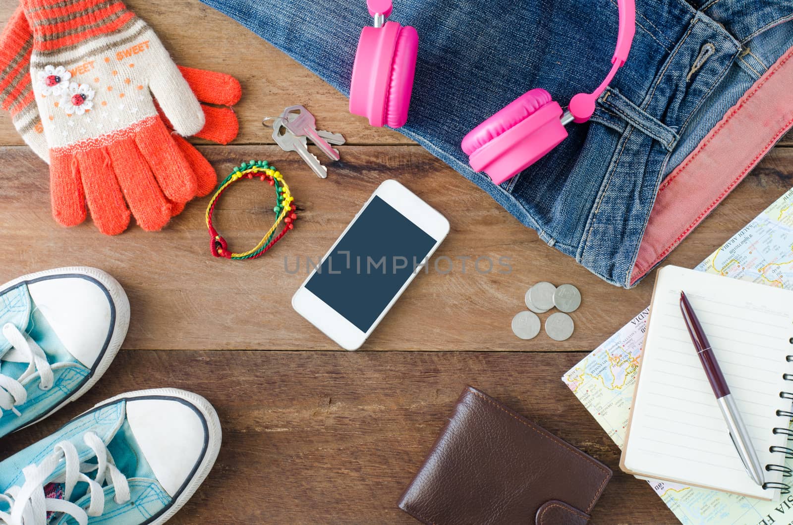 Travel accessories,Gloves, earphones, smart phones, jeans, notebooks, pens, shoes, wallet, for trip