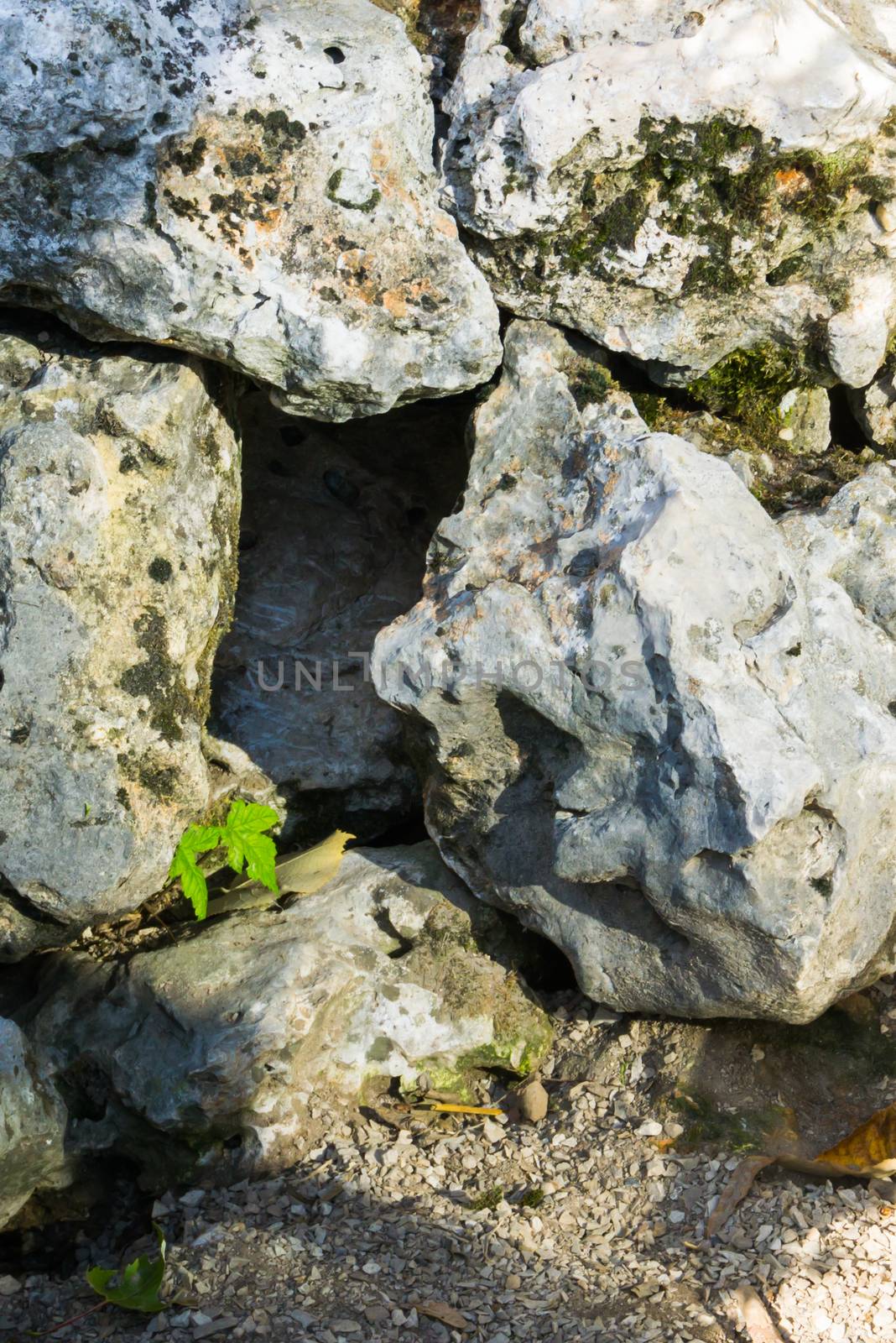 empty hole between some big rocks animal hideout by charlottebleijenberg