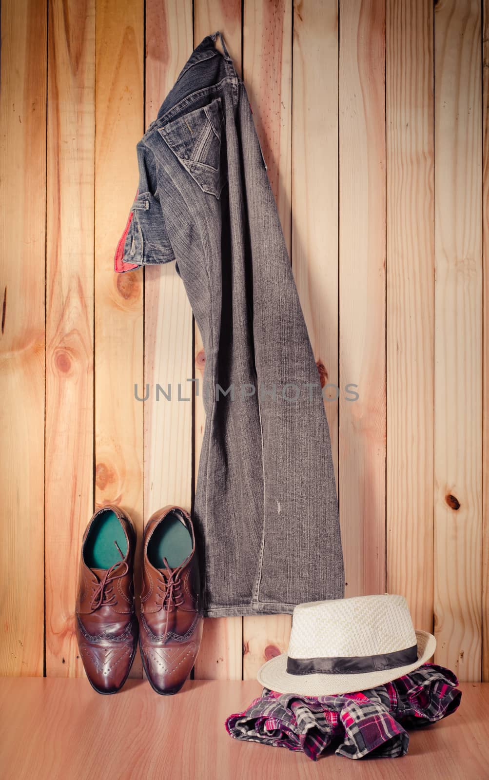 costume hanging on wooden wall background - still life tone vintage by photobyphotoboy