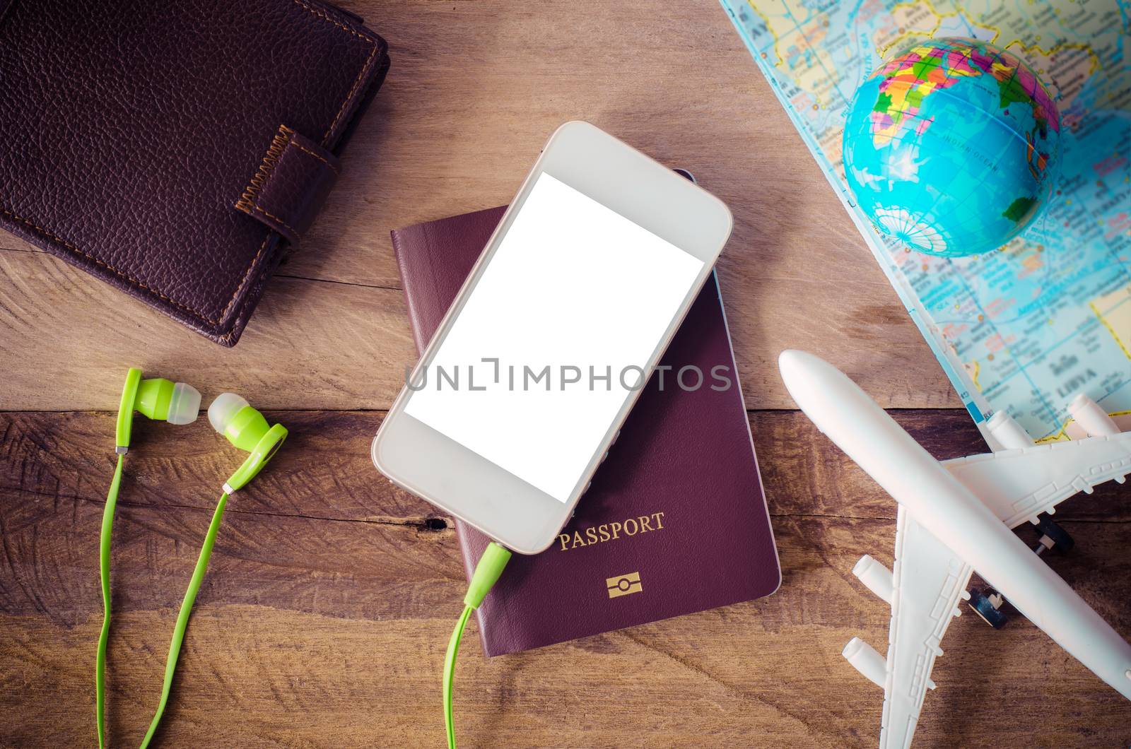 Travel accessories costumes. Passports, luggage, The cost of travel maps prepared for the trip by photobyphotoboy