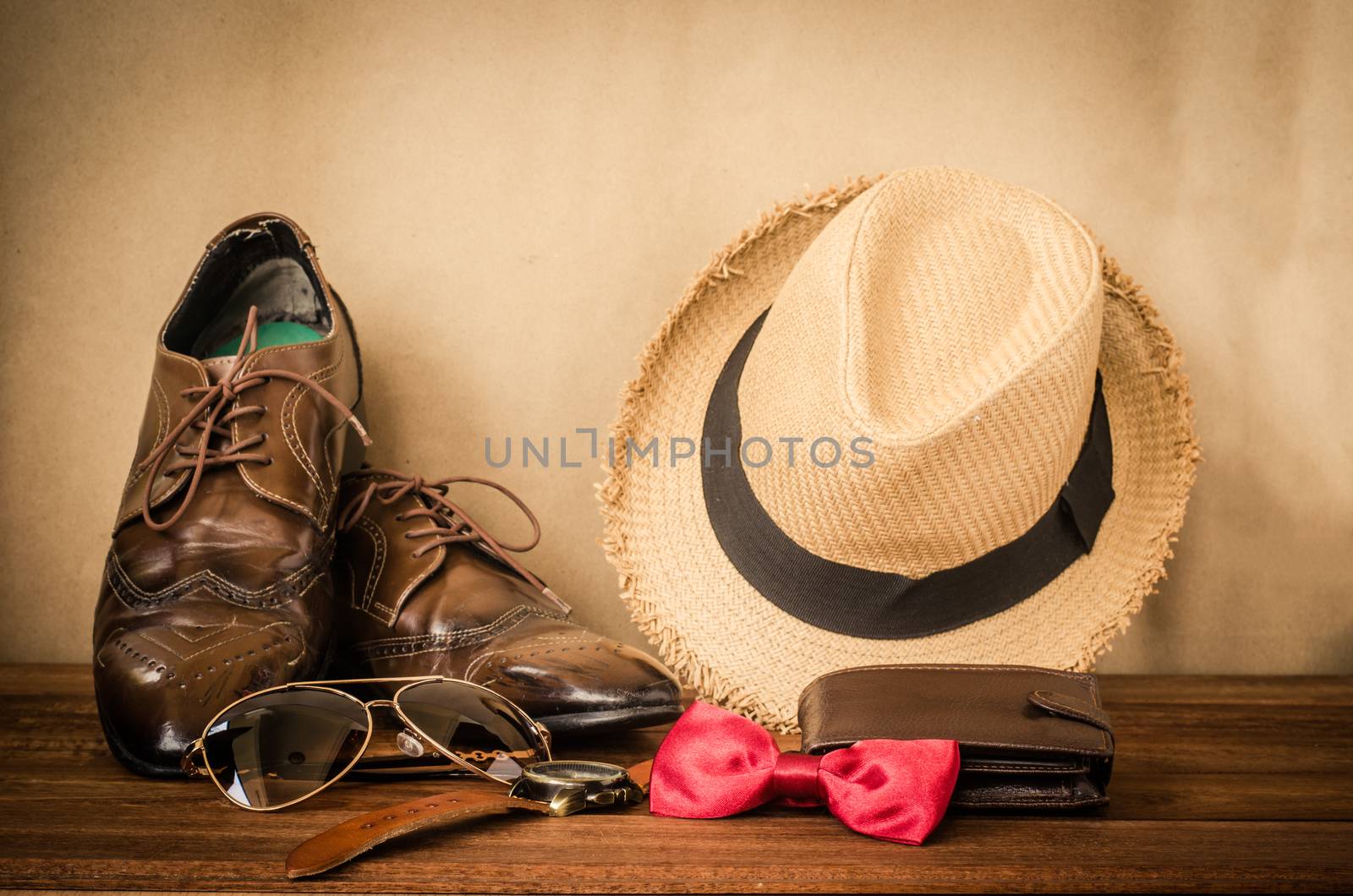 acceseries for men on the wooden floor