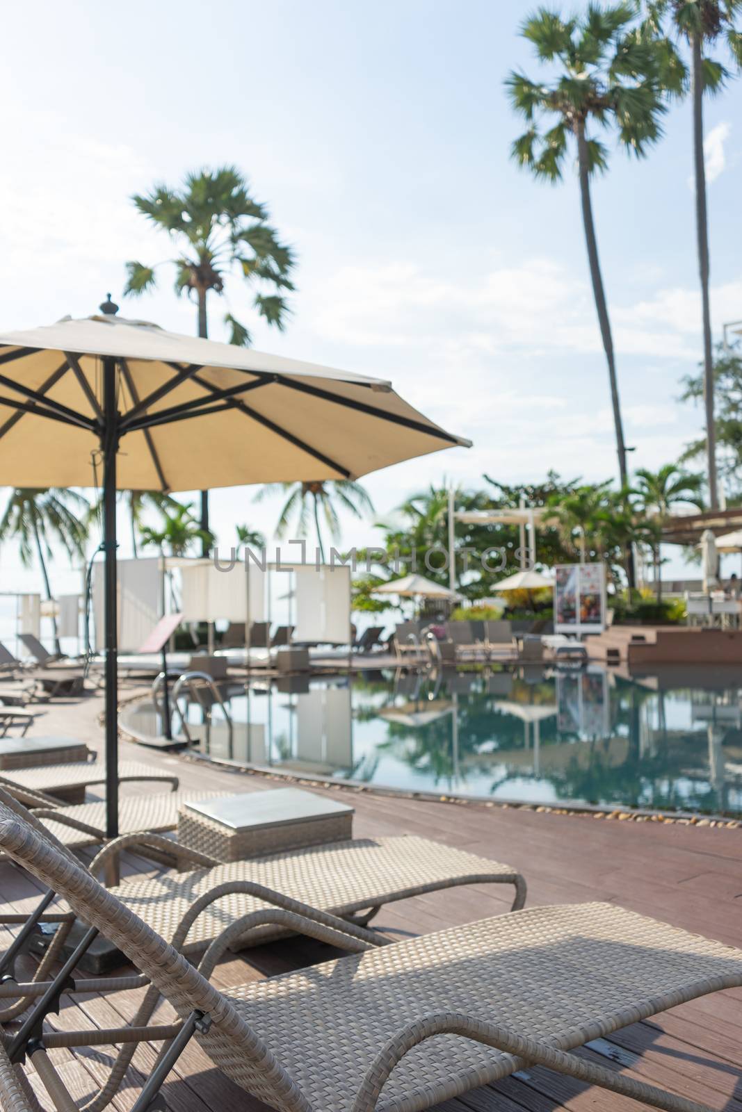 Swimming pool. Luxury hotel in Pattaya, Thailand. Summer beach vacation.
