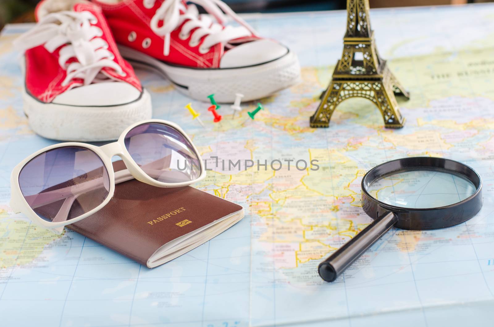 Travel accessories on the map by photobyphotoboy