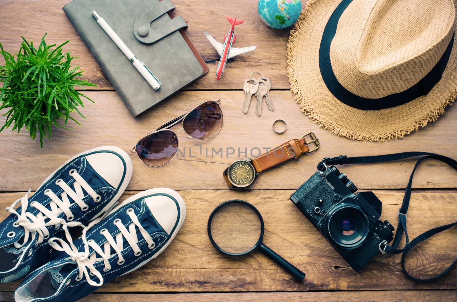 Travel accessories for trip on wood by photobyphotoboy