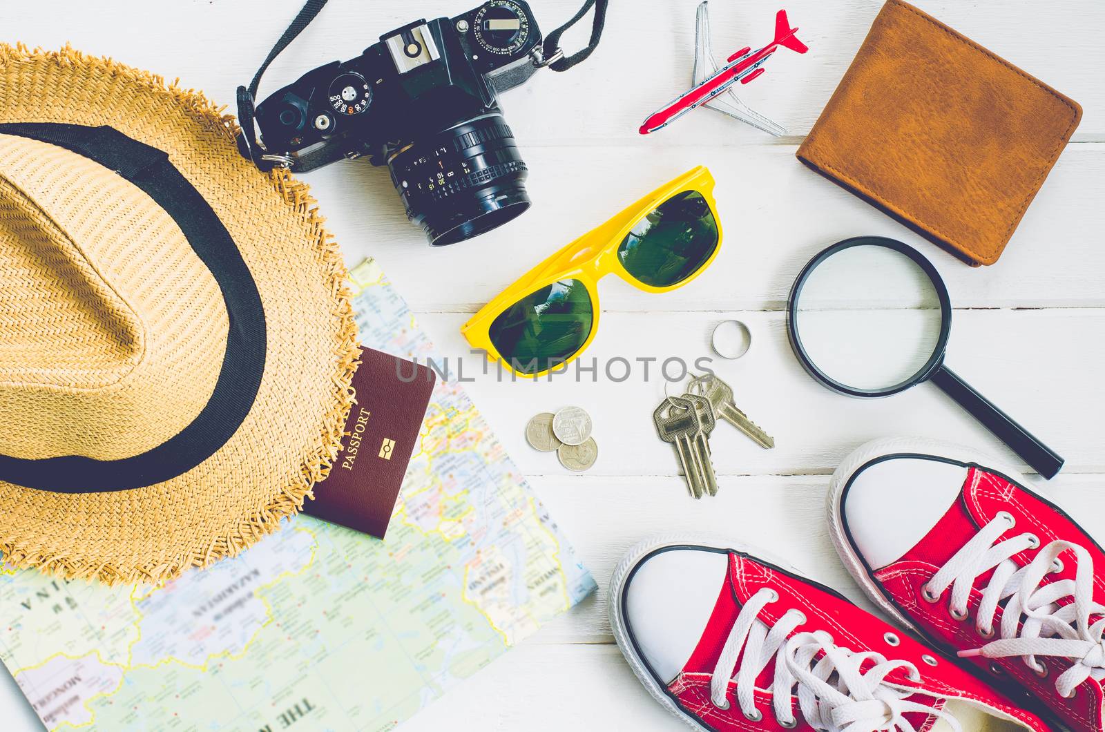 Travel accessories and costume on white background by photobyphotoboy
