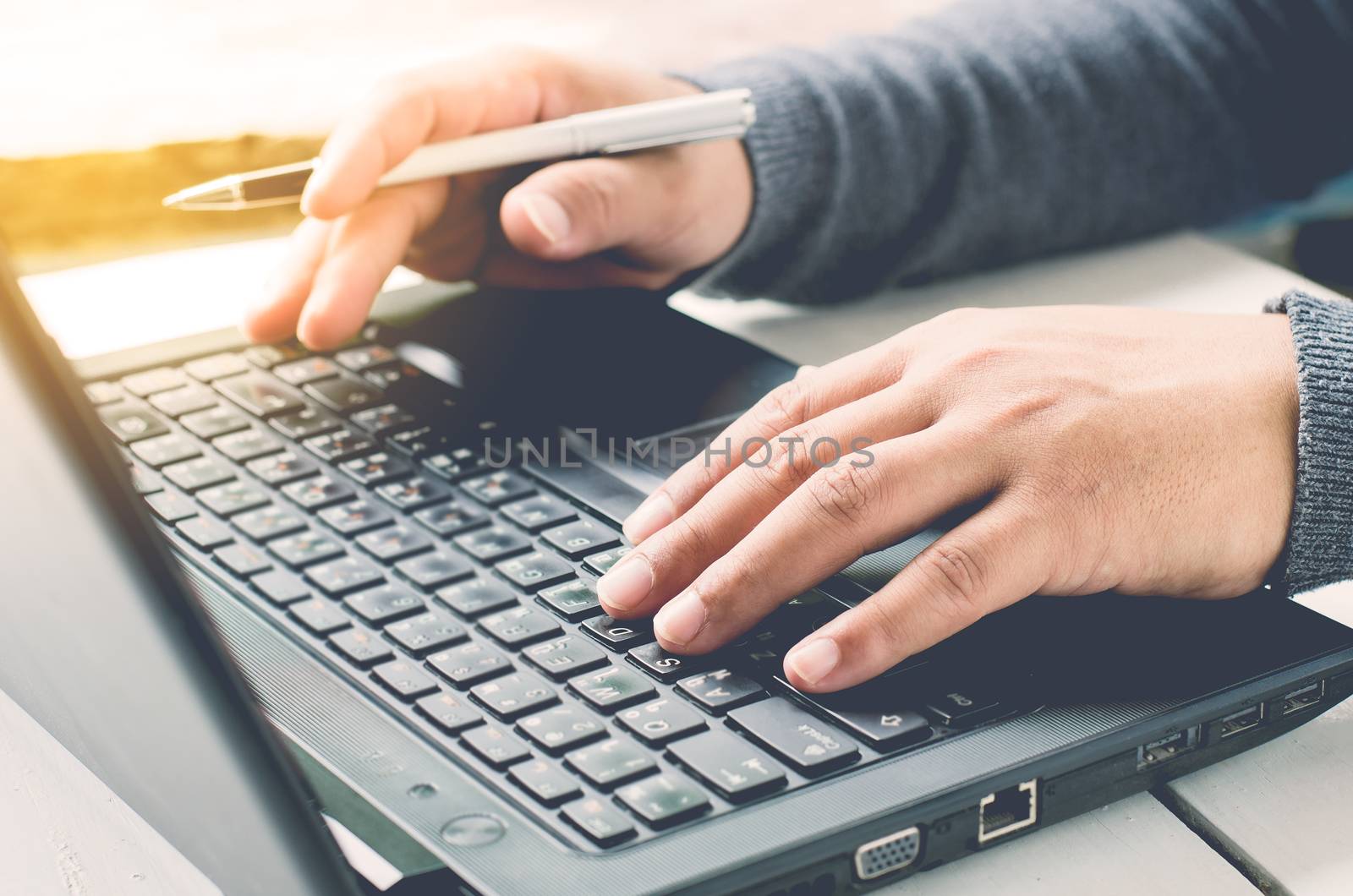 Closeup hand are using laptops