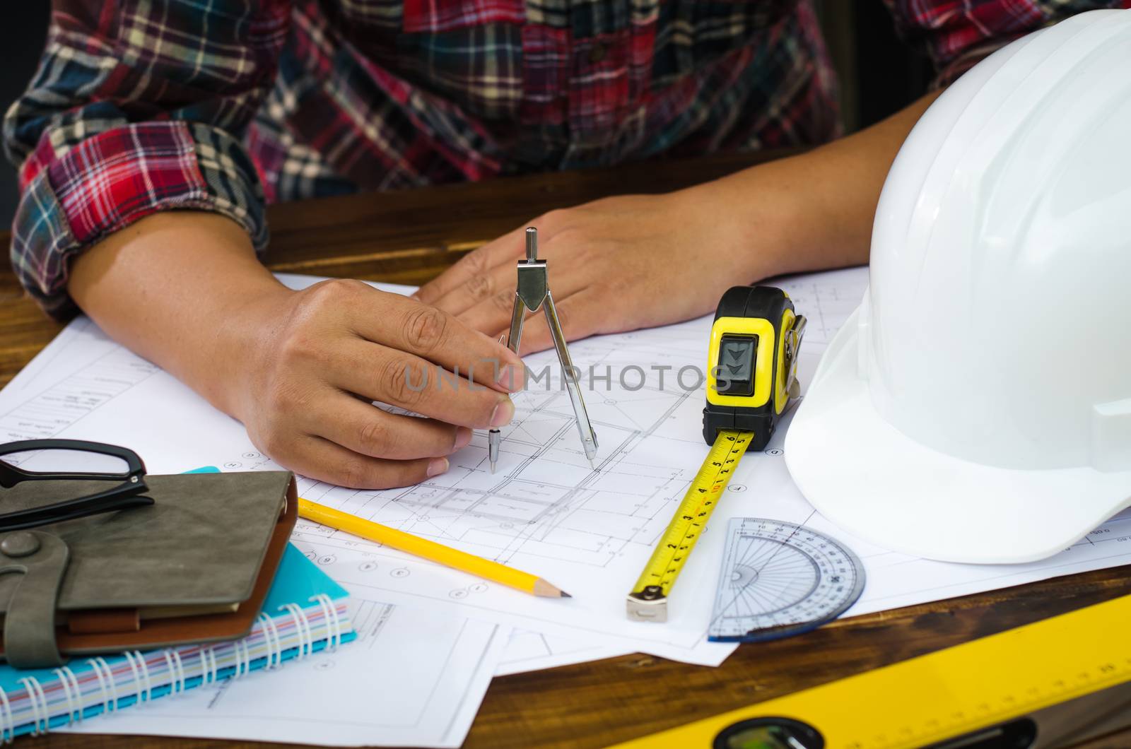 Engineering draftsman working in the office.