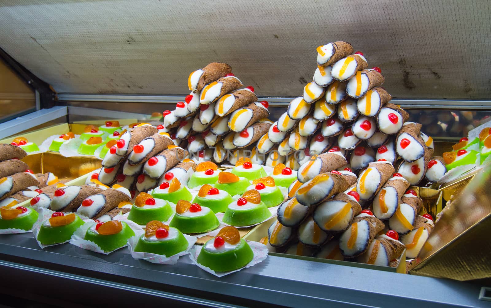 close-up of counter with beautiful and delicious cakes in Cagliari, Sardinia.