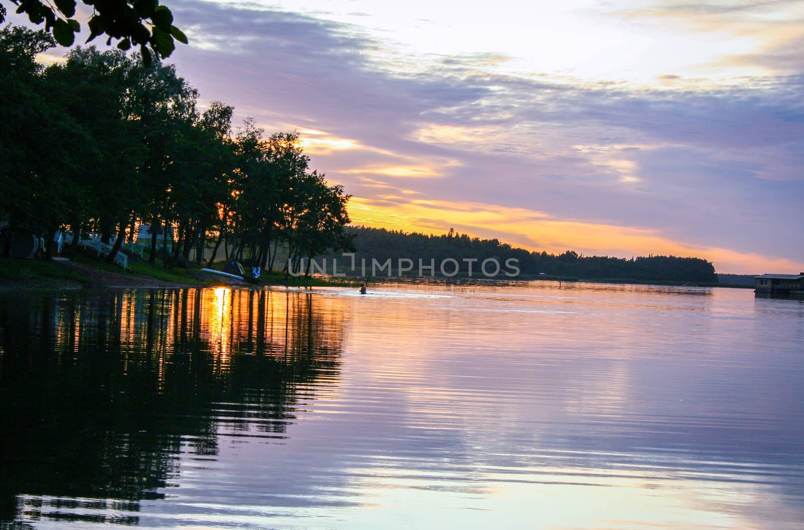 sunset on a lake in Finland