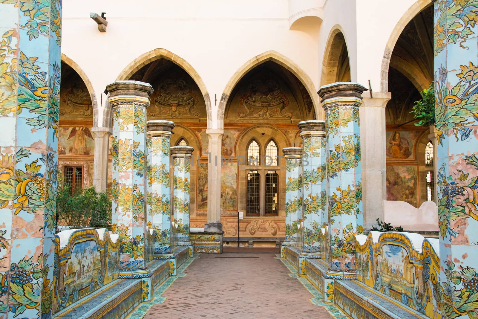  NAPLES - ITALY - ON  11/13 /2016 - The beautiful cloister of Santa Chiara with its majolica tiles in Naples, Italy