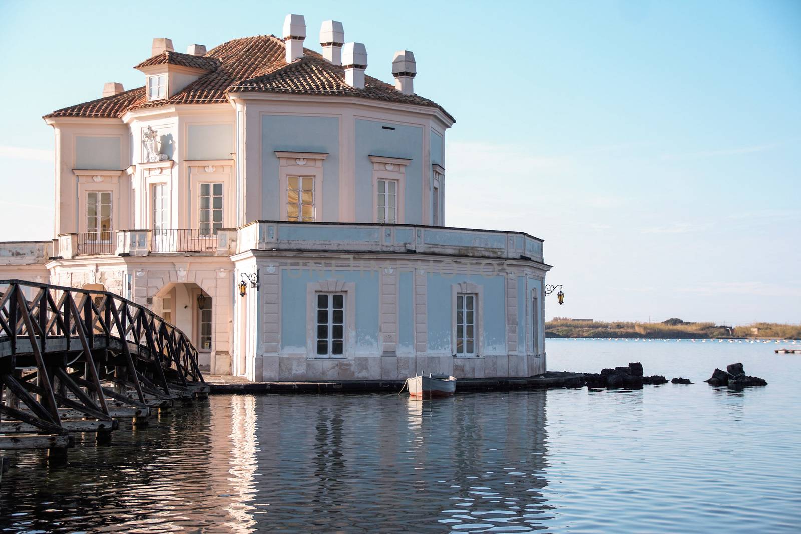 The elegant Casina Vanvitelliana on lake Fusaro, Pozzuoli, Naples, Italy