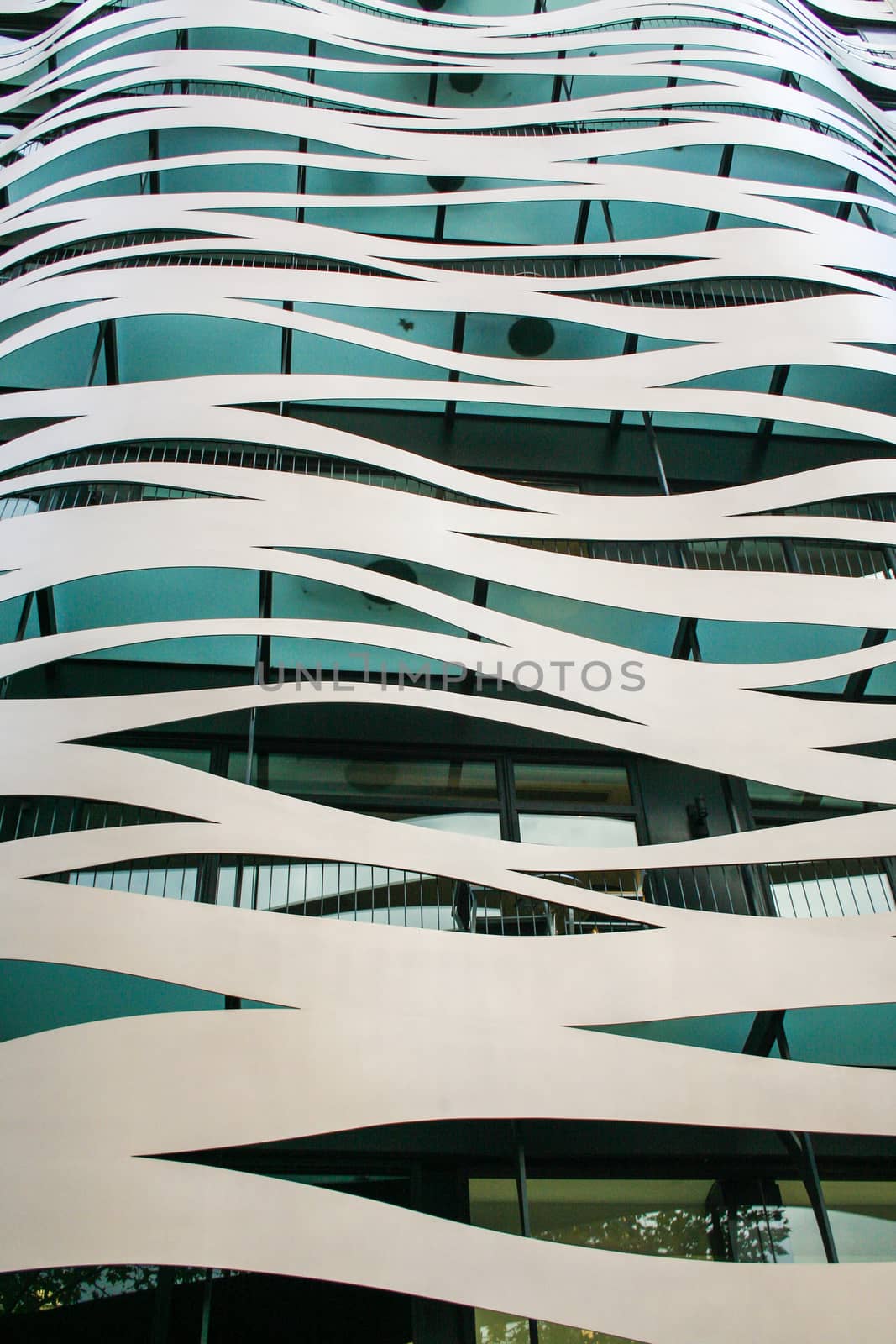 Façade of the Suites Avenue Building by architect Toyo Ito on Passeig de Gràcia, Barcelona, Spain.