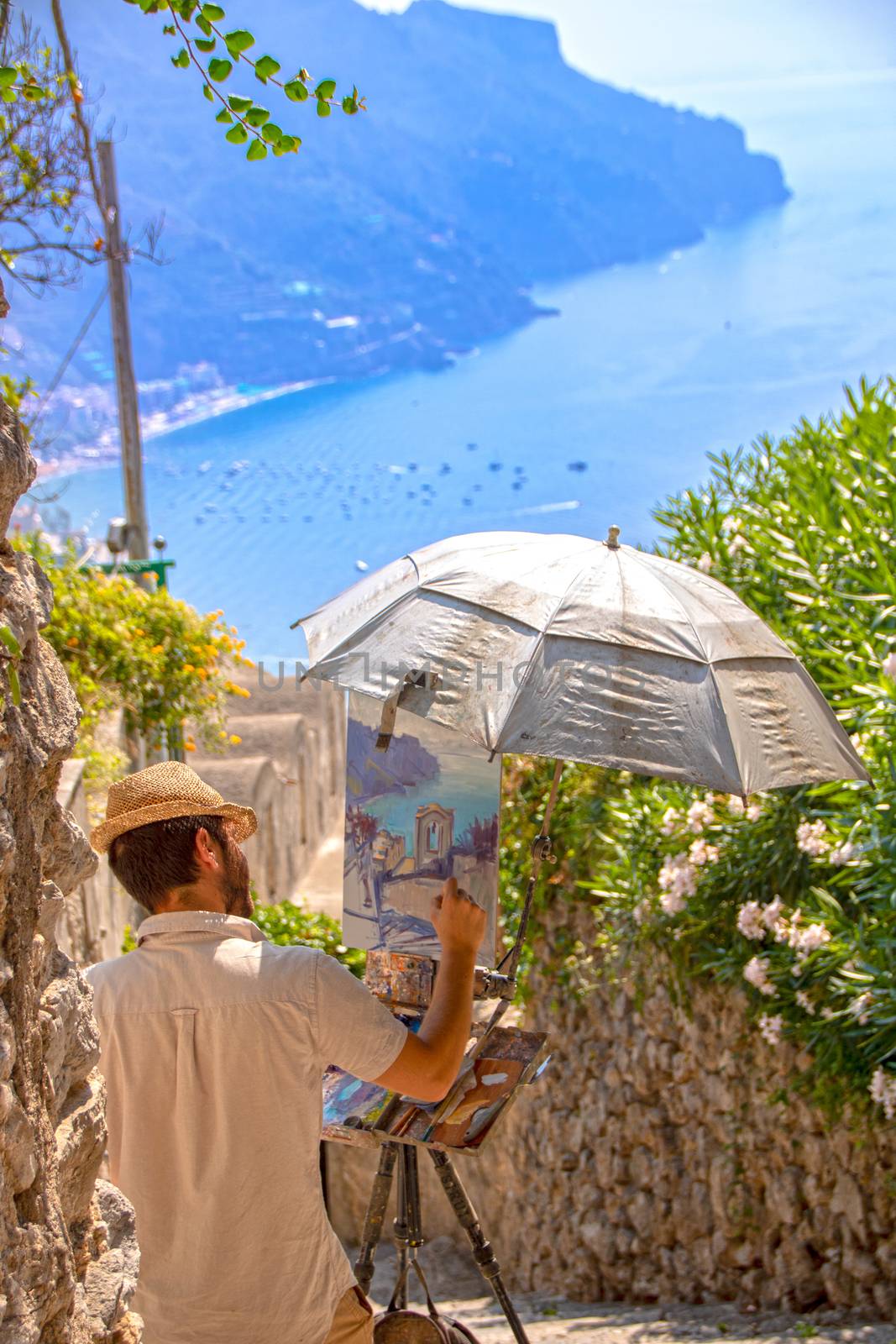 At Ravello - Italy - On august 2018 - A painter reproducing a lovely view of Ravello in Via dell'Annunziata 
