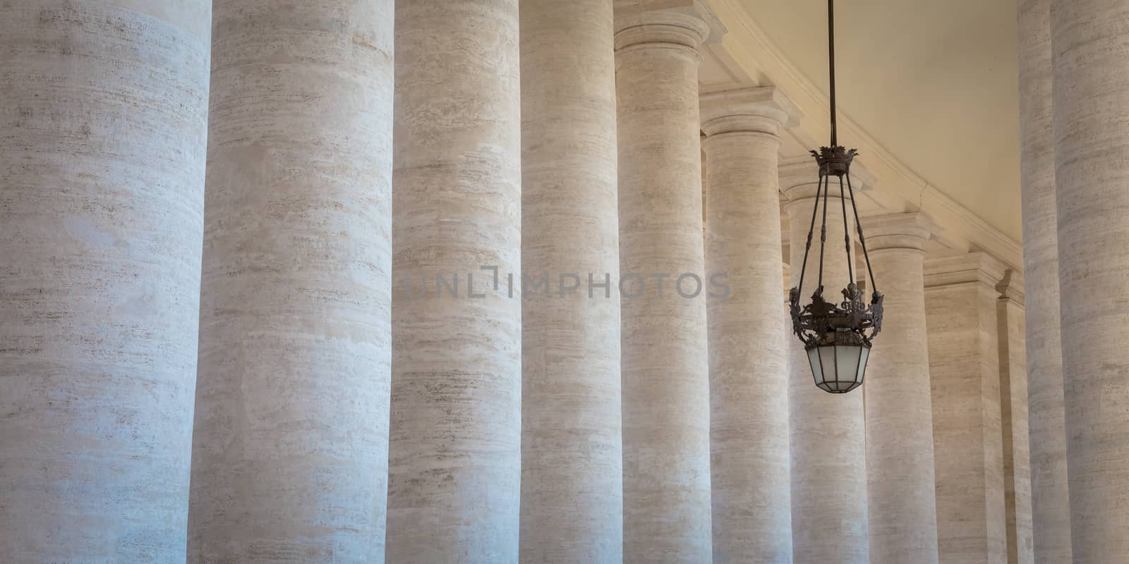 St. Peter's Square in Vatican City, Rome, is bordered on two sides by semi-circular colonnades made by Bernini.