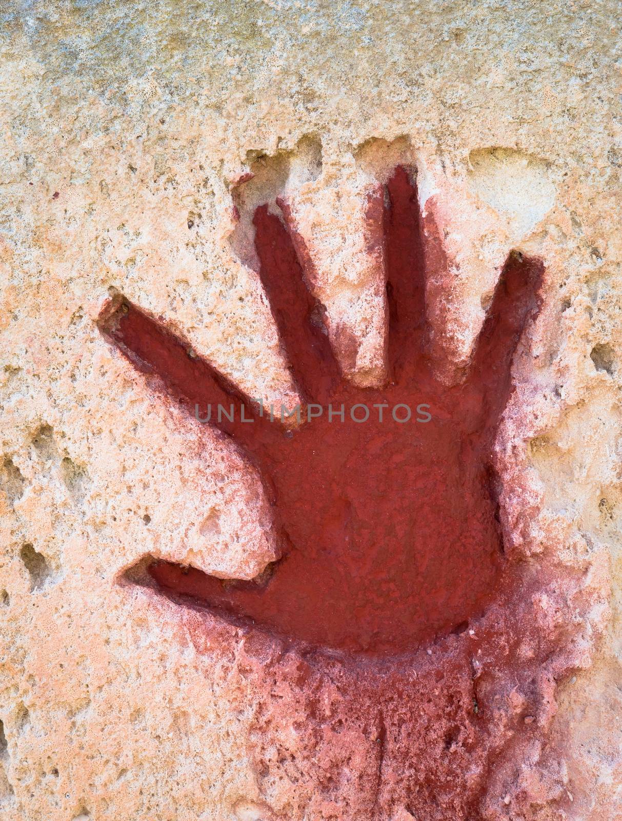 Young hand painted in red on stone - graphic gothic element