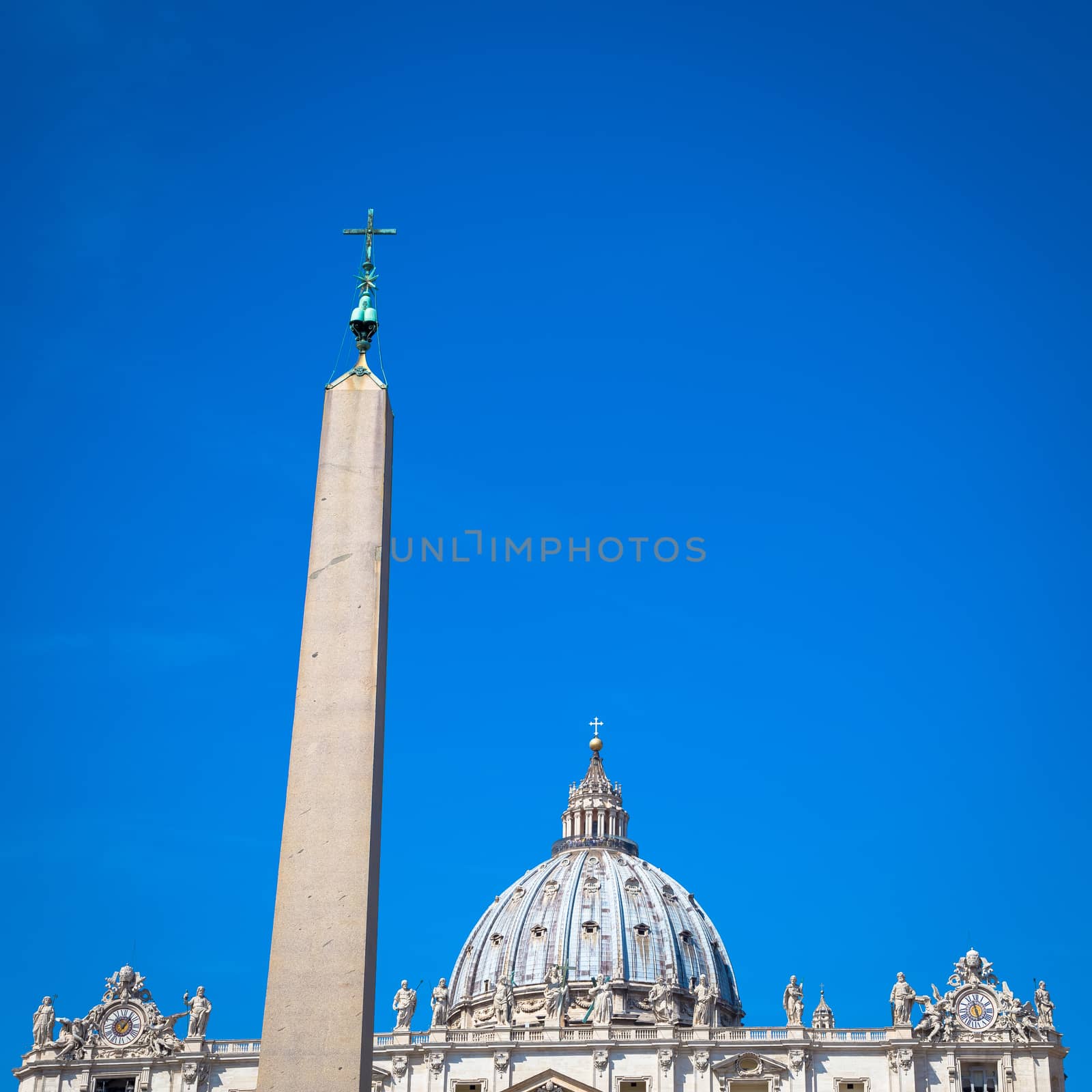 St Peter Basilica detail with a blue sky background for copy space - Rome, Vatican State