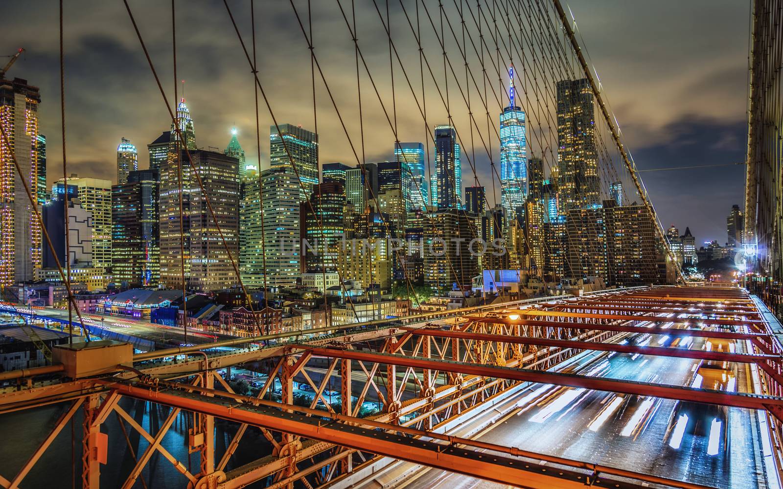 Night shot of Manhattan, New York from the Brooklyn Bridge.