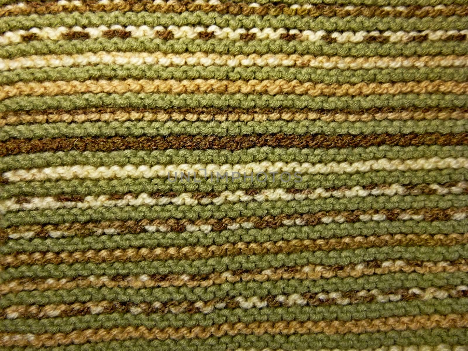 Knitted fabric texture. Background image. Hobbies, leisure, crafts. Horizontal arrangement of the pattern. Green and brown. by Julia_Faranchuk