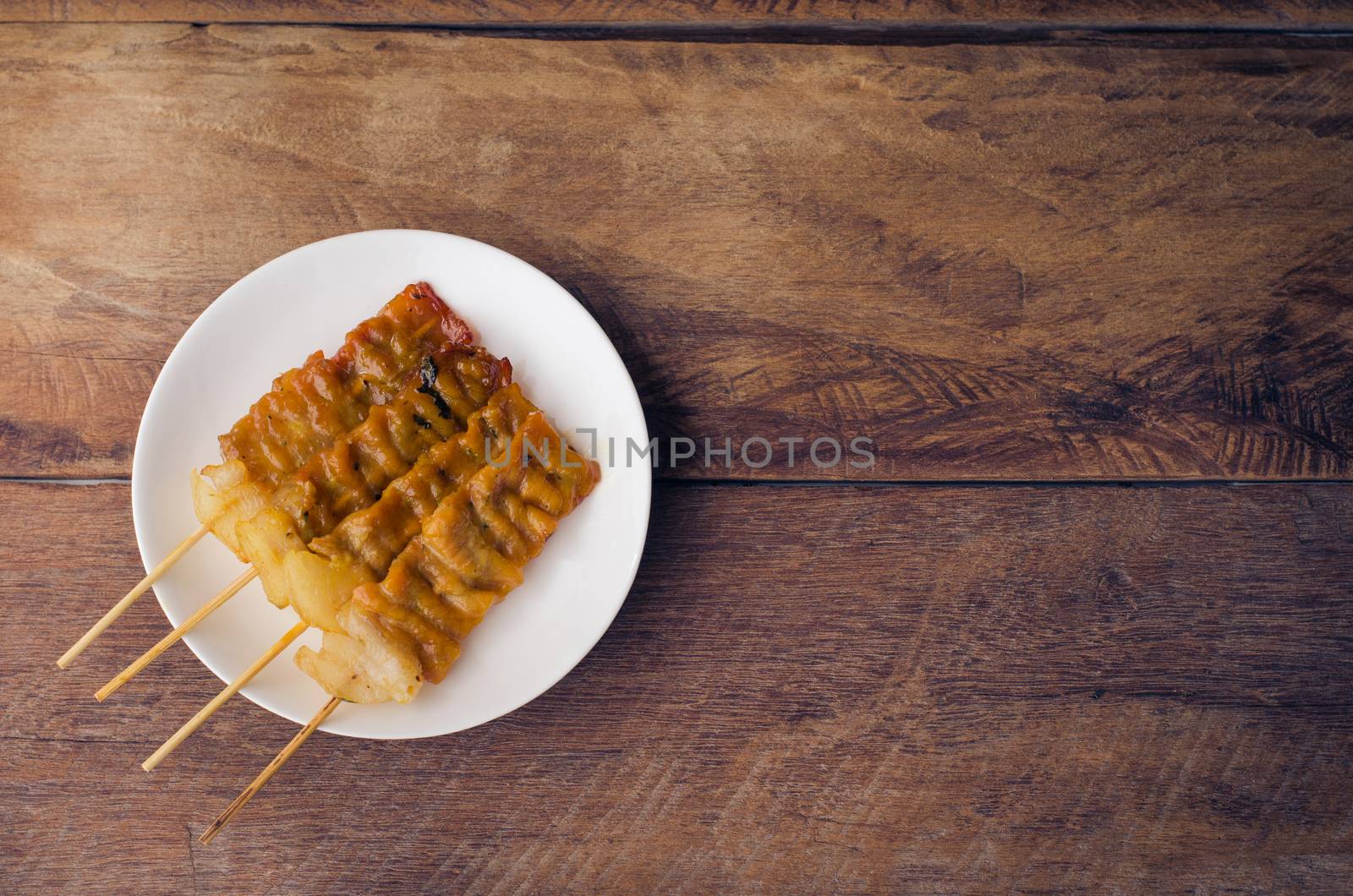 Thai styled pork babeque on wood backgrond