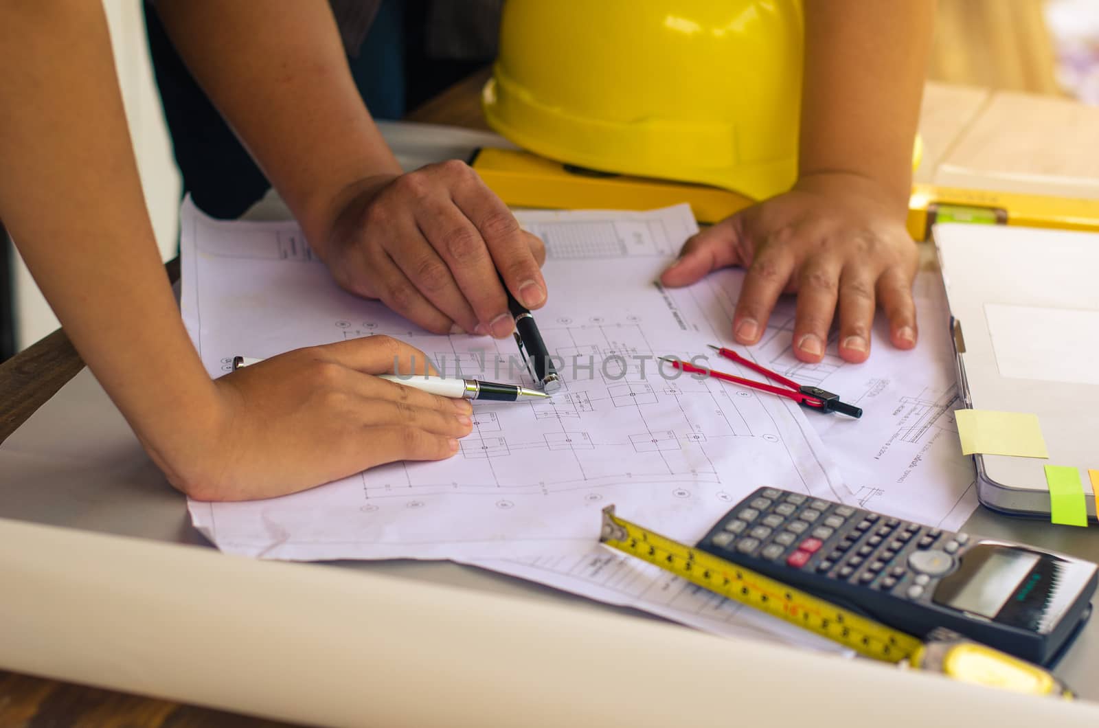 Team construction job . working with laptop in open space office. Meeting report in progress. business concept