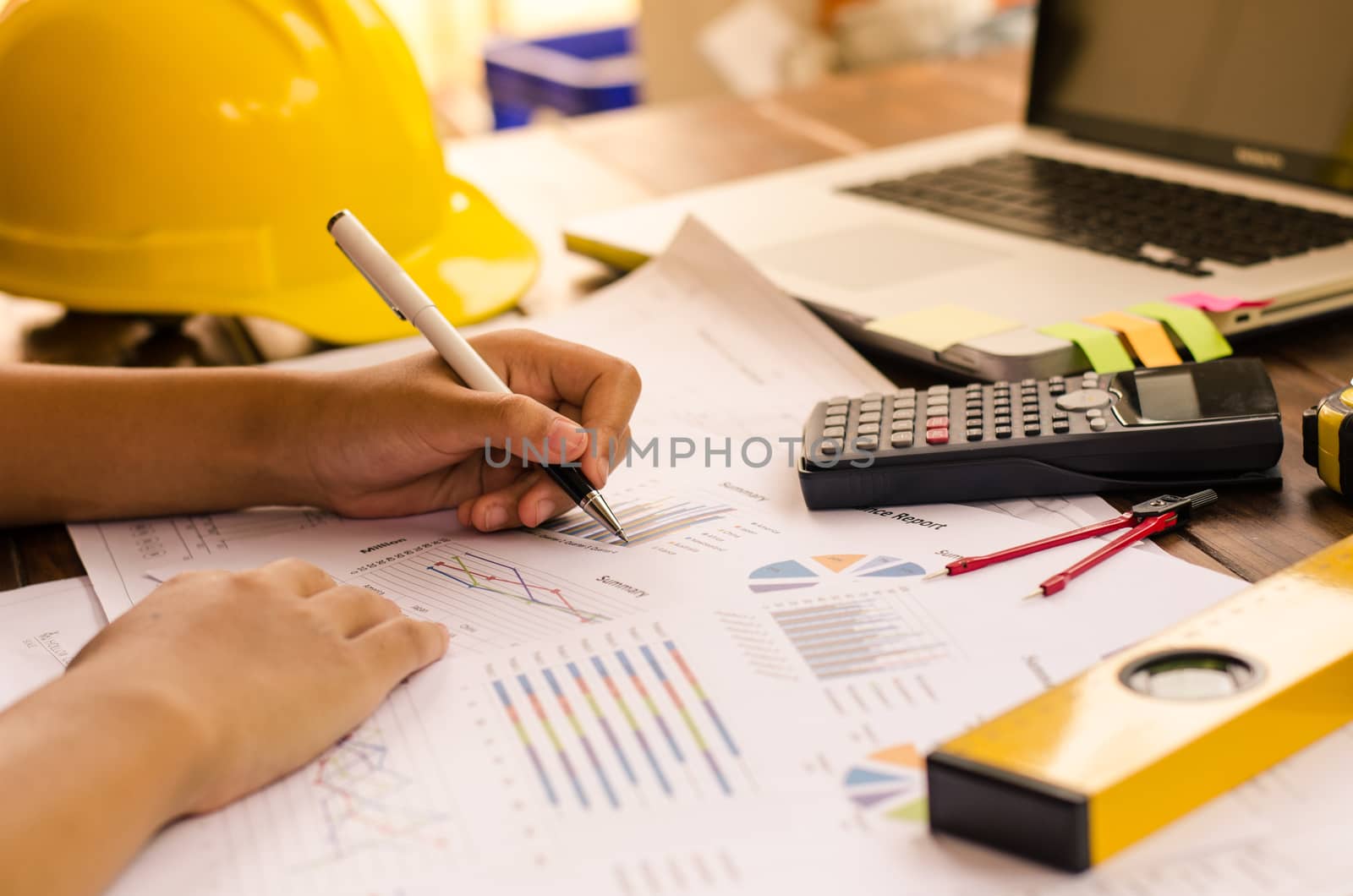 Team construction job . working with laptop in open space office. Meeting report in progress. business concept