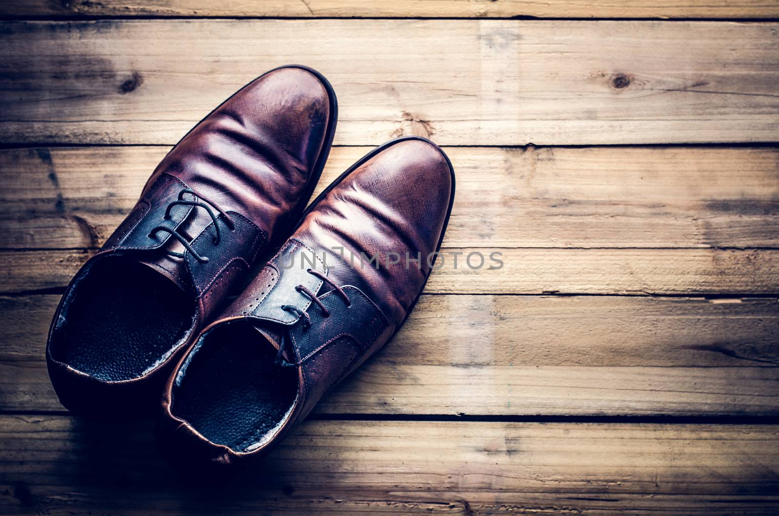 Leather shoes on the wooden floor.