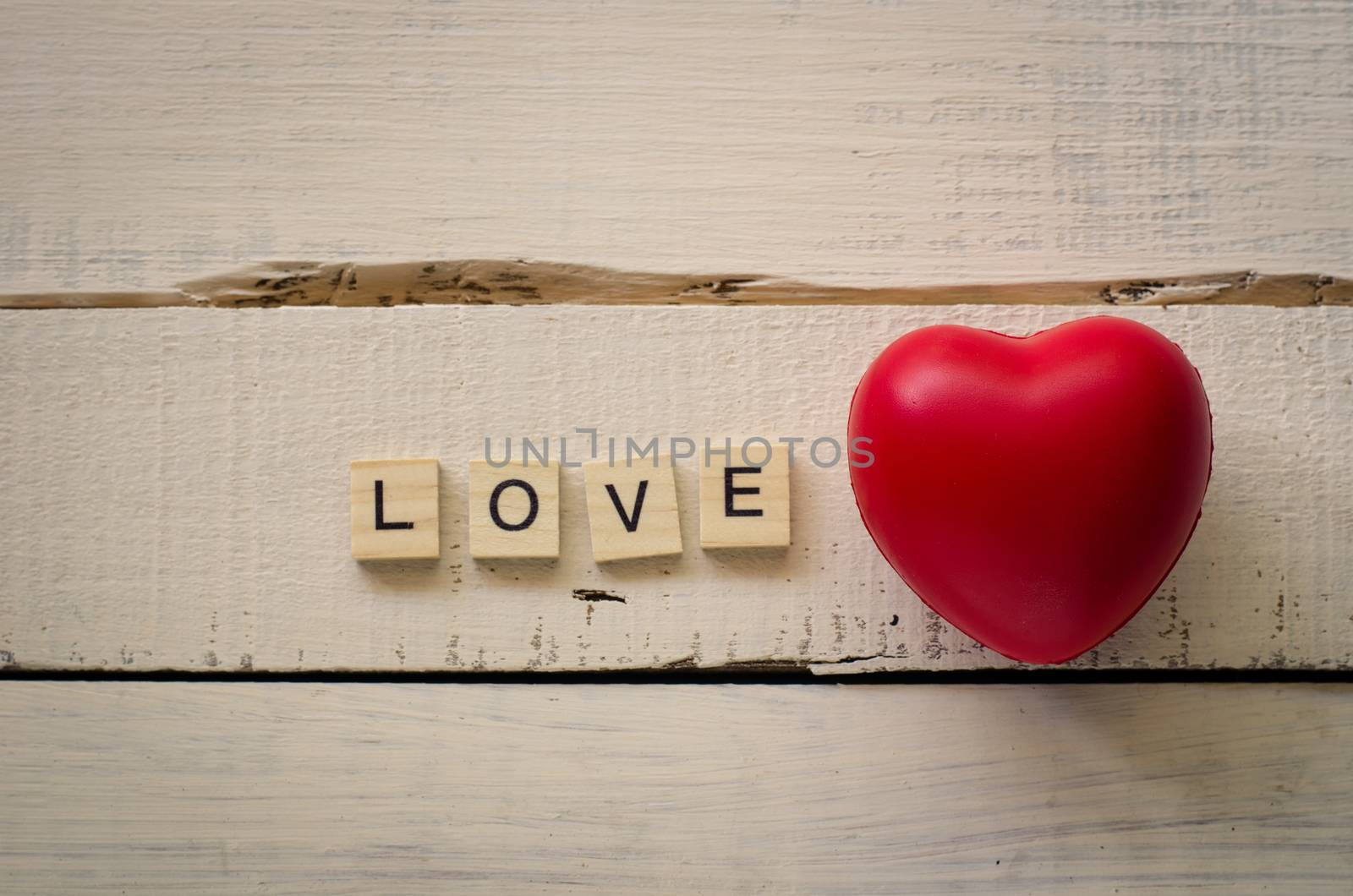 Valentines Day background with hearts and the word love.