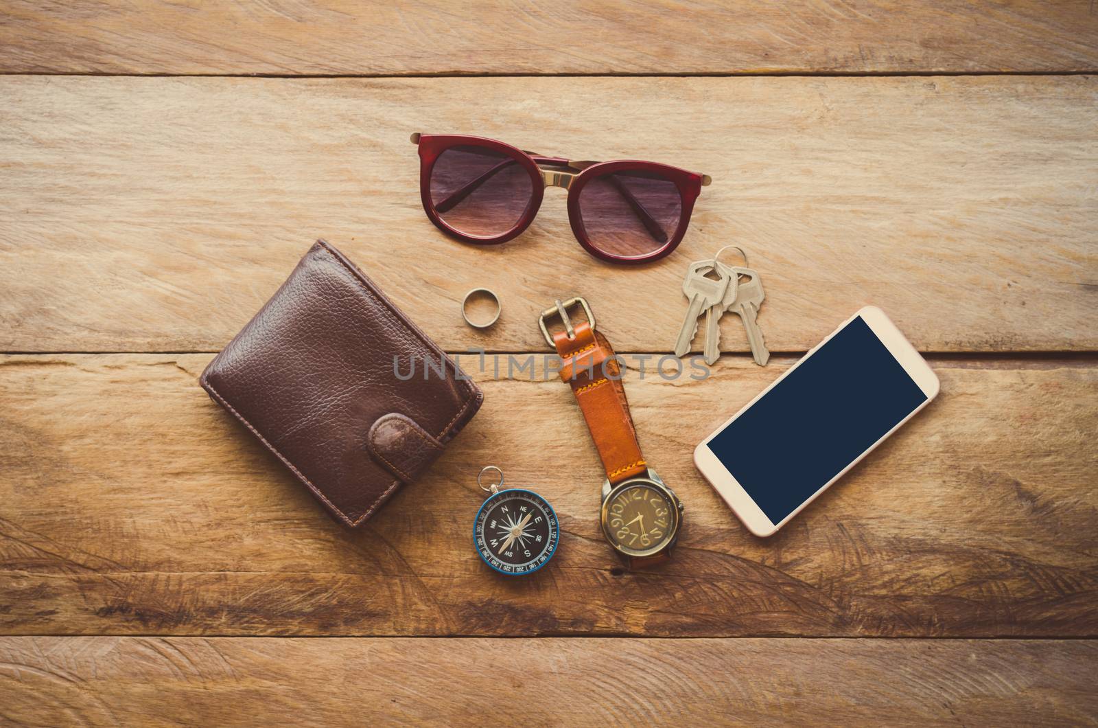 Accessories for men on the wooden floor.