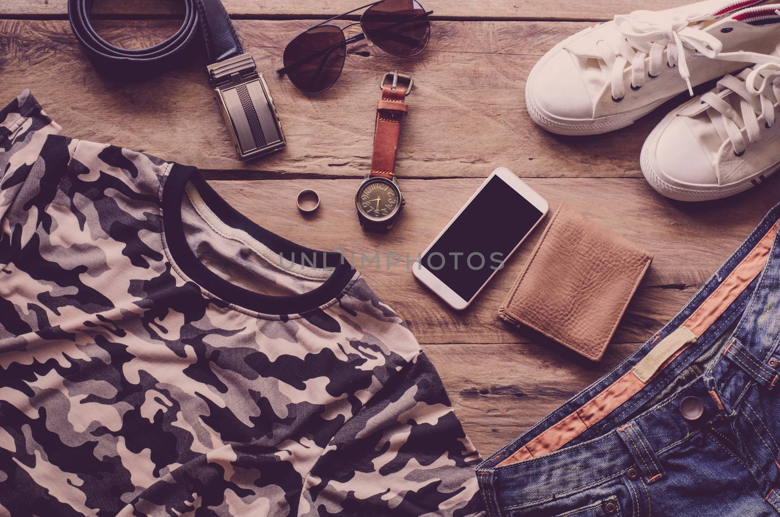 Travel Clothing accessories Apparel along on wooden floor 