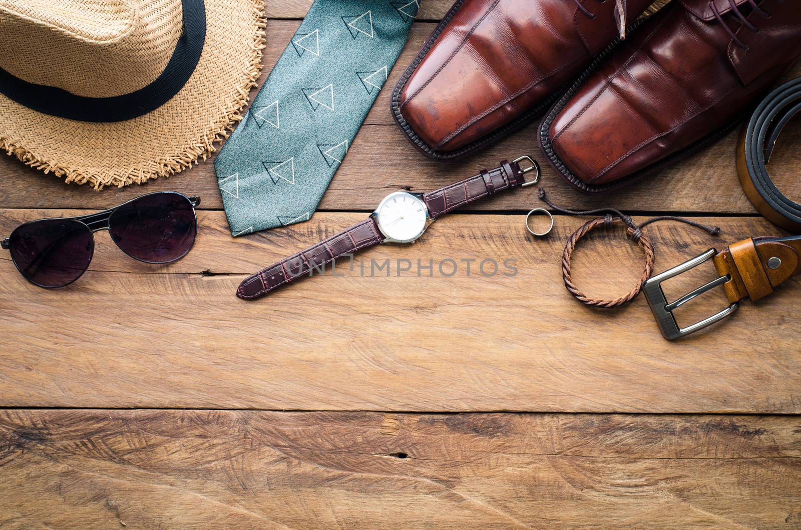 Travel Clothing accessories Apparel along on wooden floor 