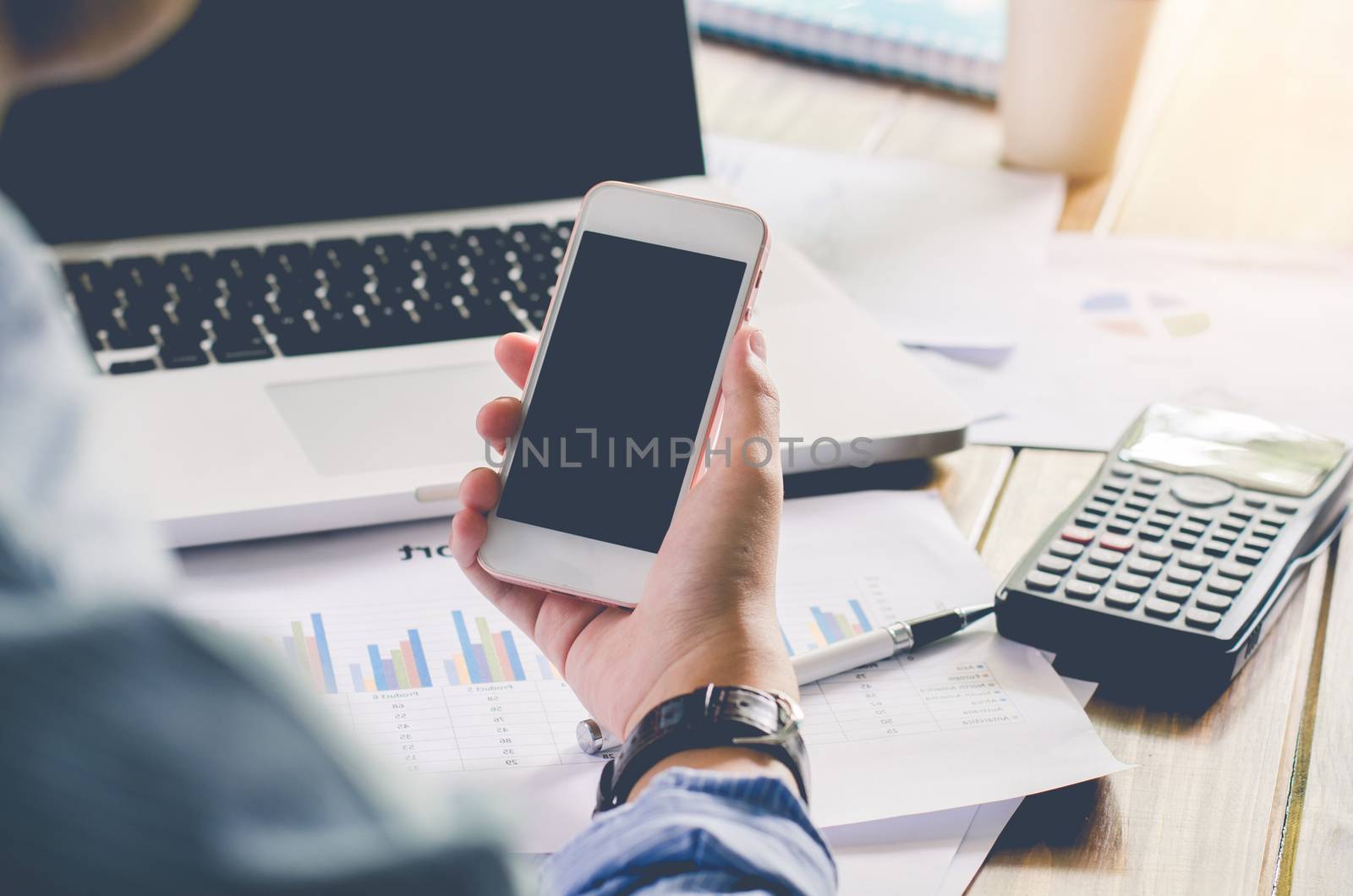 Businessman working with for smartphone 