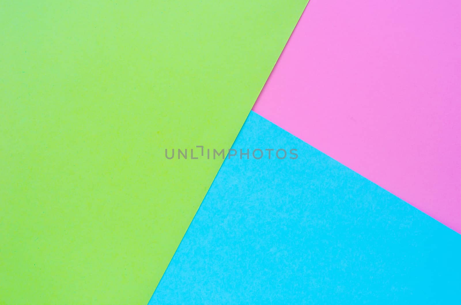 Colorful of pink, green and blue paper background