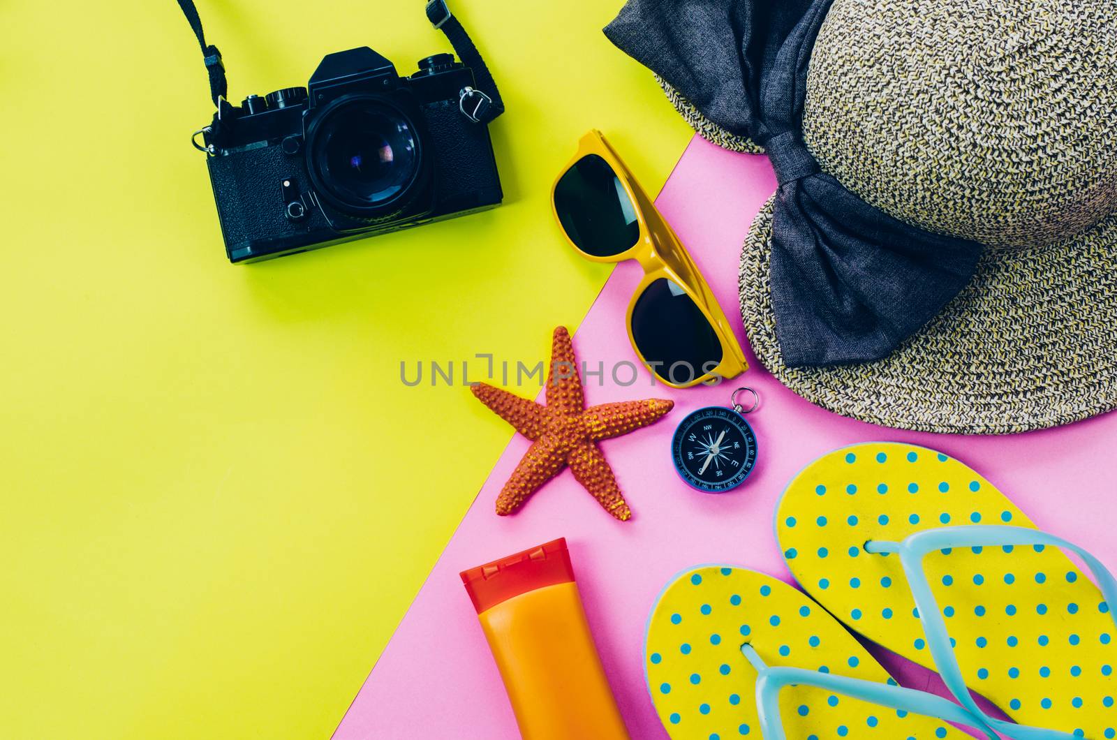 Clothing accessories for summer on multicolor paper floor - conc by photobyphotoboy