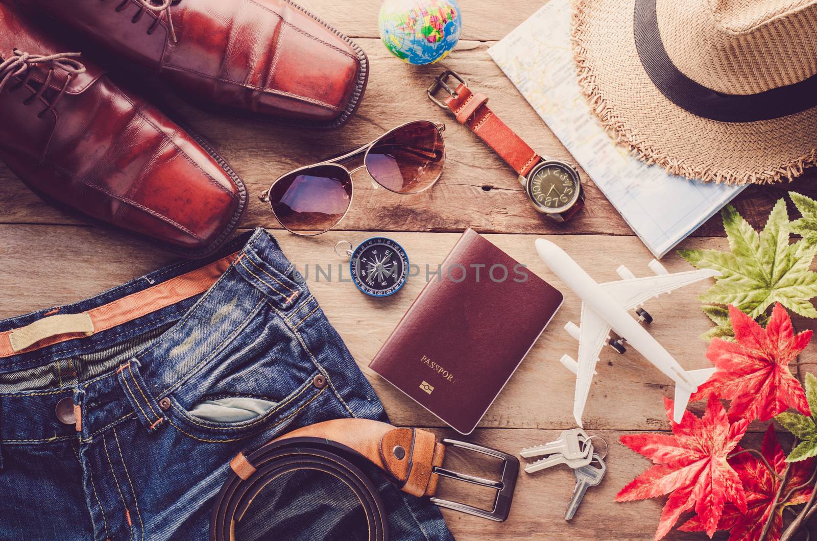 Travel accessories costumes. Passports, luggage, The cost of travel maps prepared for the trip