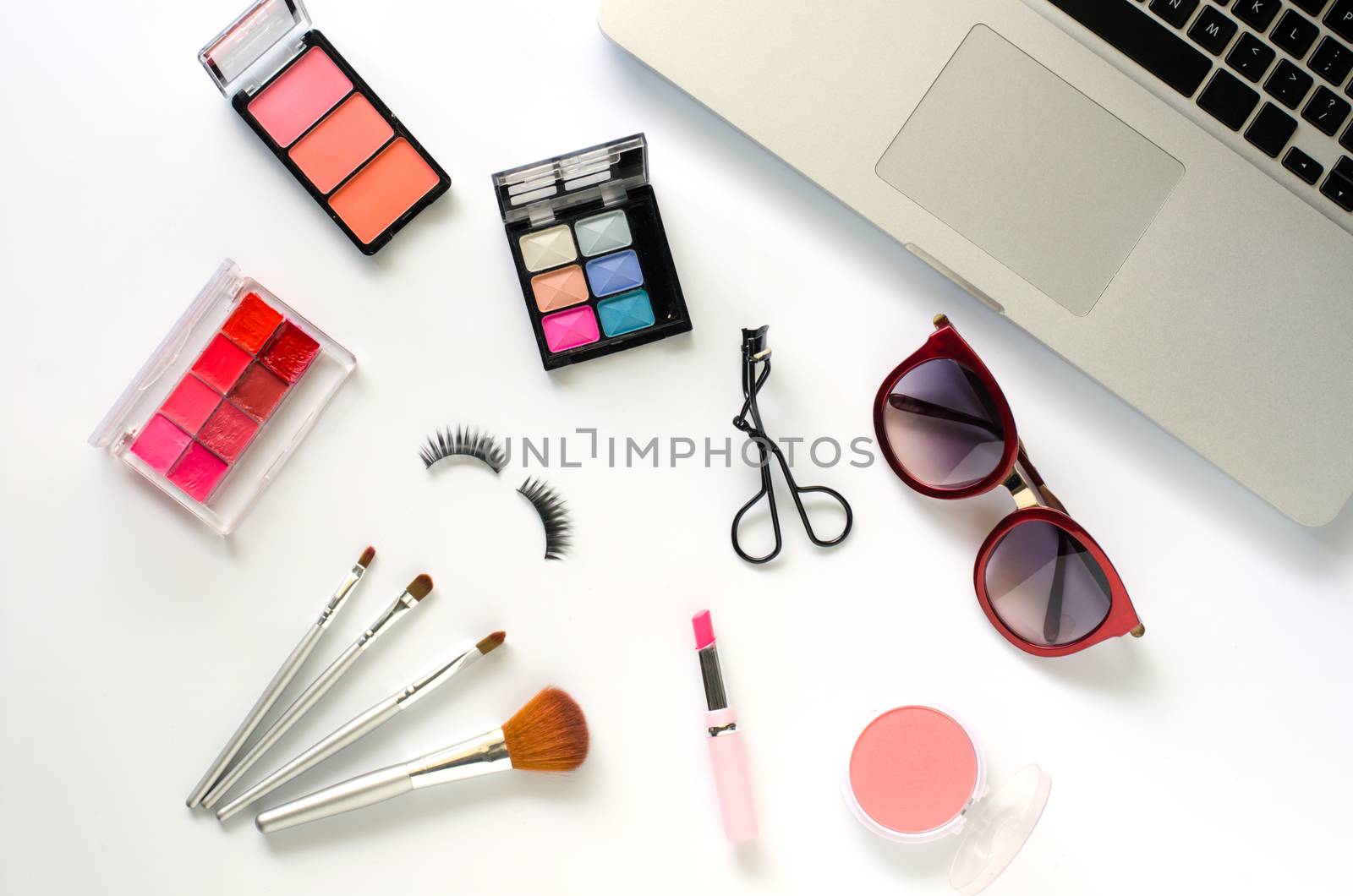 Set of decorative cosmetics and accessories for women on white background