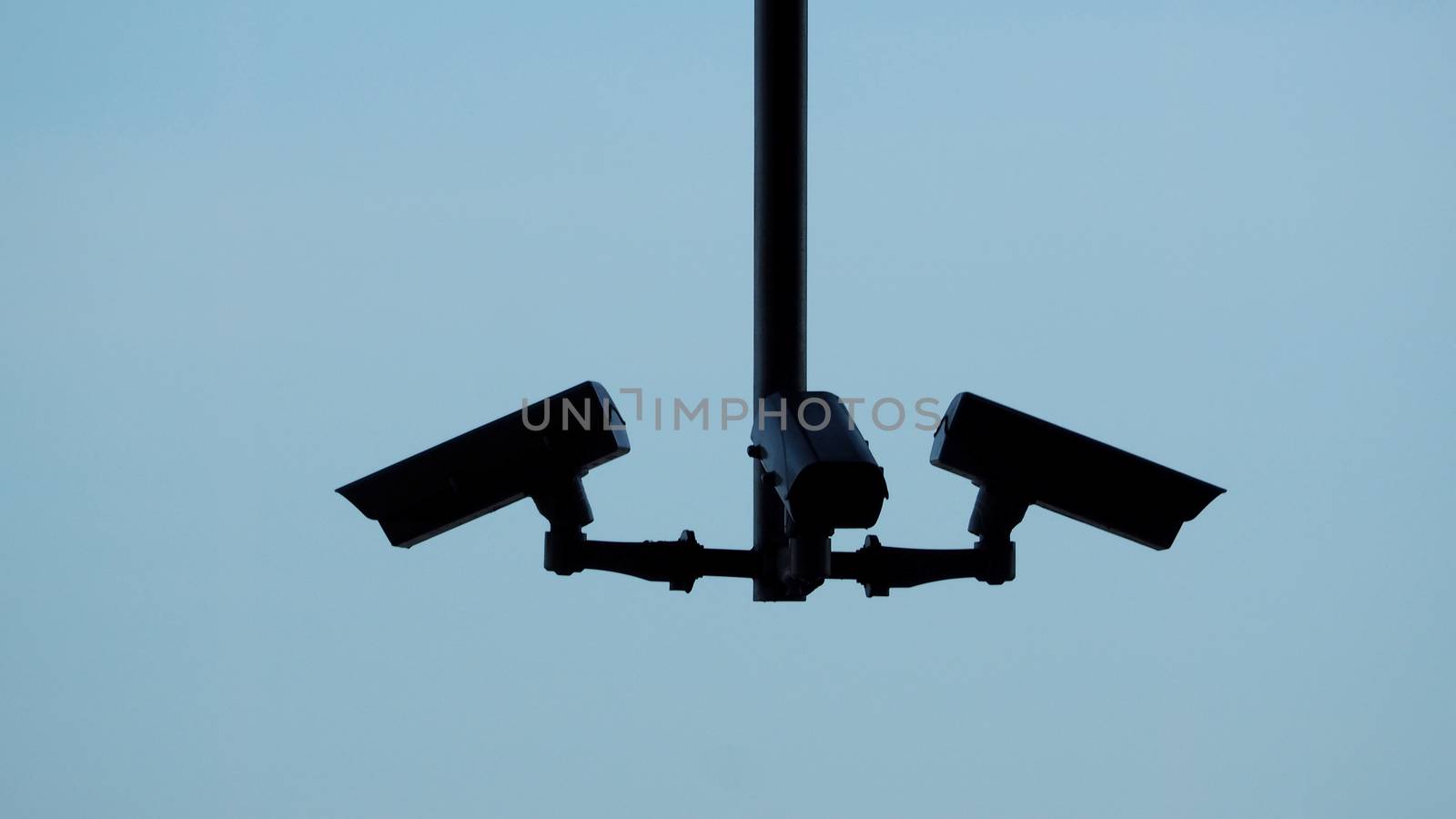 Silhoutte images of security camera or cctv video surveilance by gnepphoto