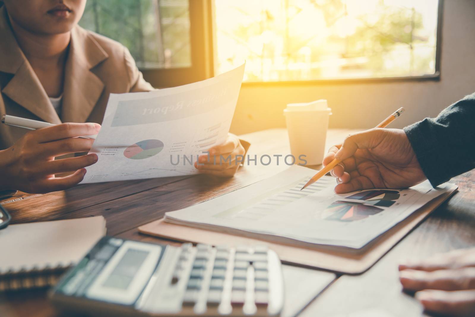 Team business man's job . working with document for financial in open space office. Meeting report in progress. sun glare effect