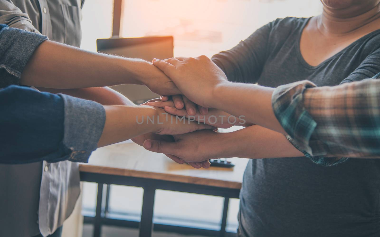 Encourage unity in the team who are about to start the assignment.The team collaborated and support together concept for work 