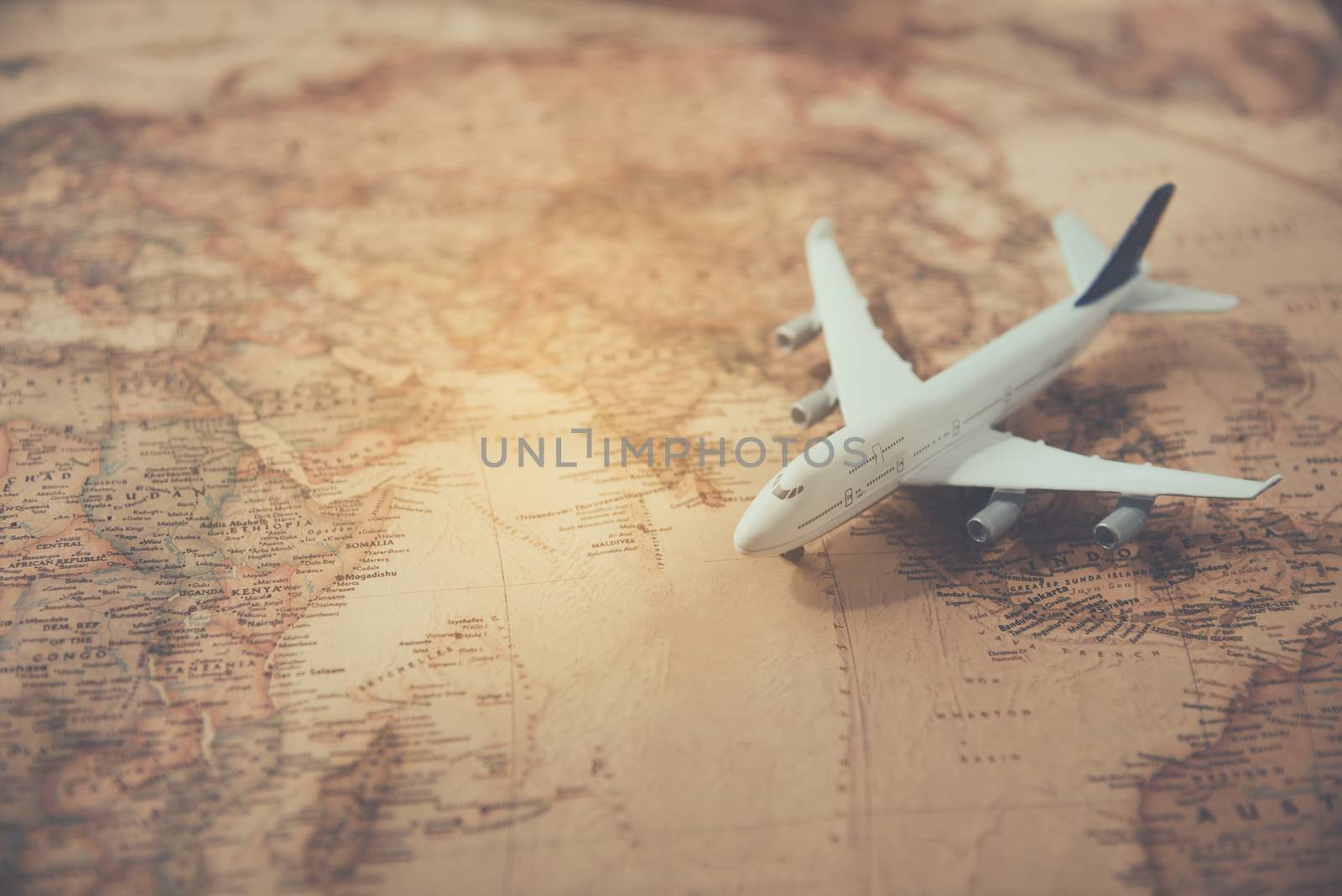 Planes placed on a map-concept travel by photobyphotoboy