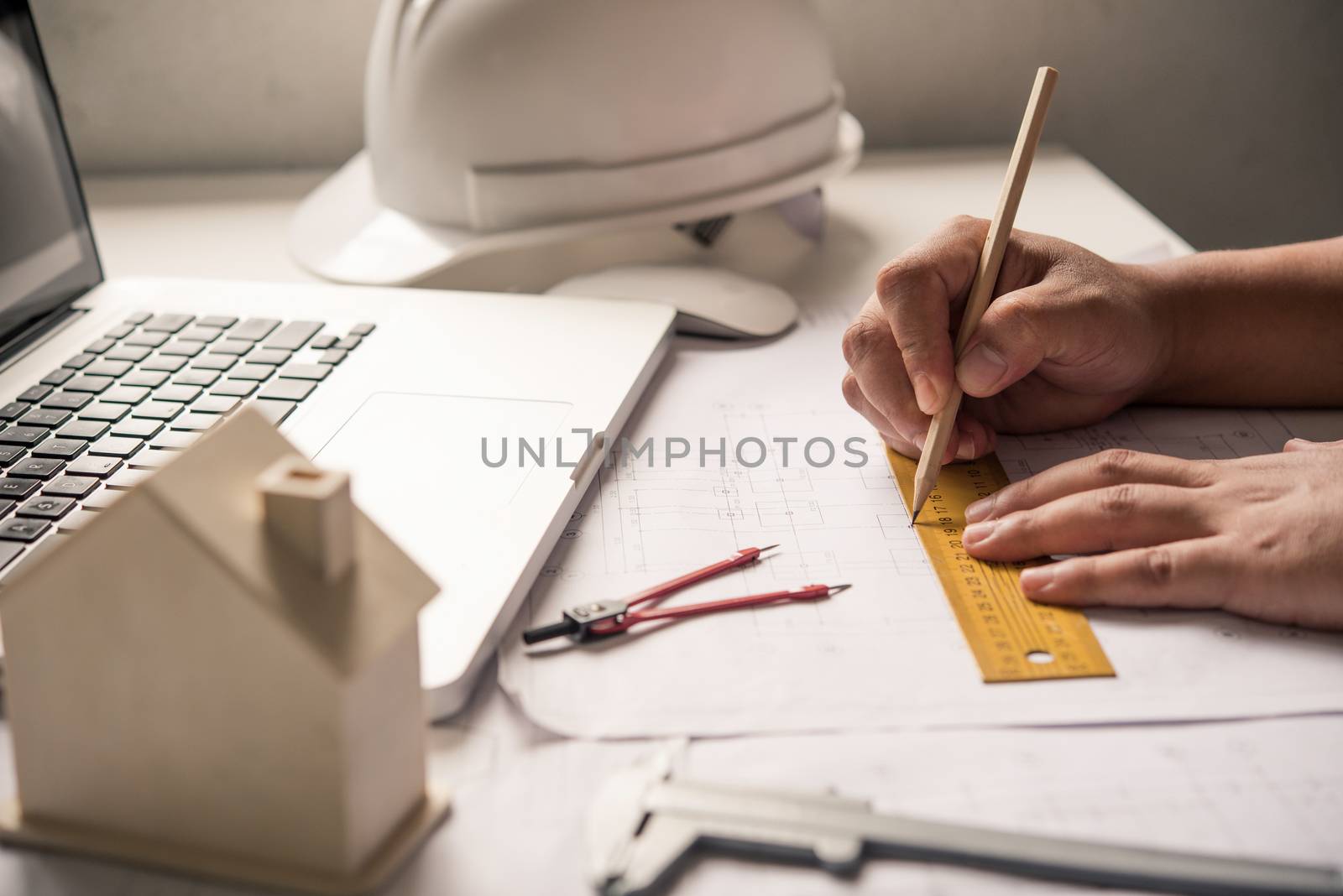 Engineering is working on the design, construction on the work table with work equipment.