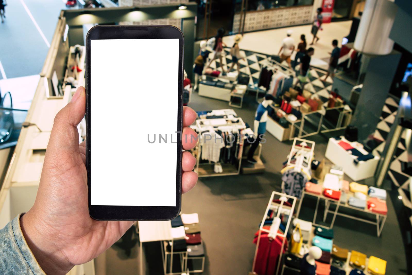 Mock up Blank screen smartphone in shopping mall background of b by photobyphotoboy