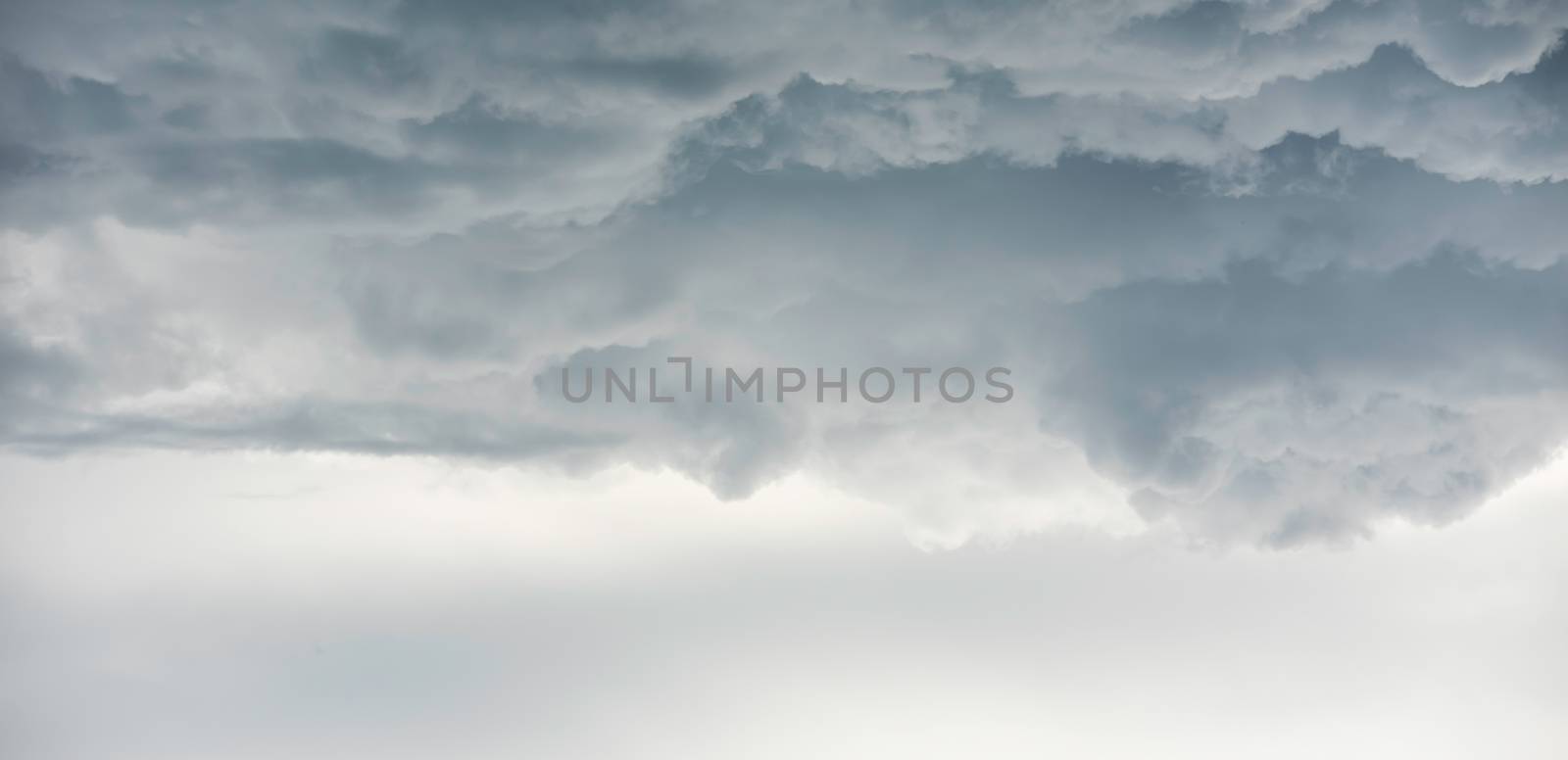 Rain clouds background.Clouds become dark gray like a big smoke  by photobyphotoboy