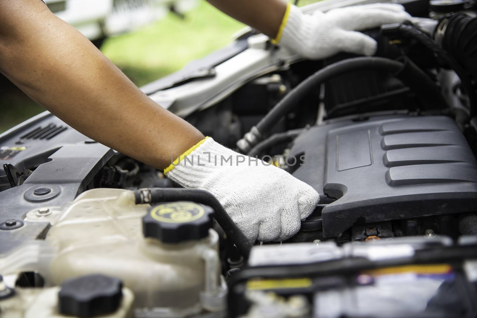 Professional mechanic is checking for engine malfunction
