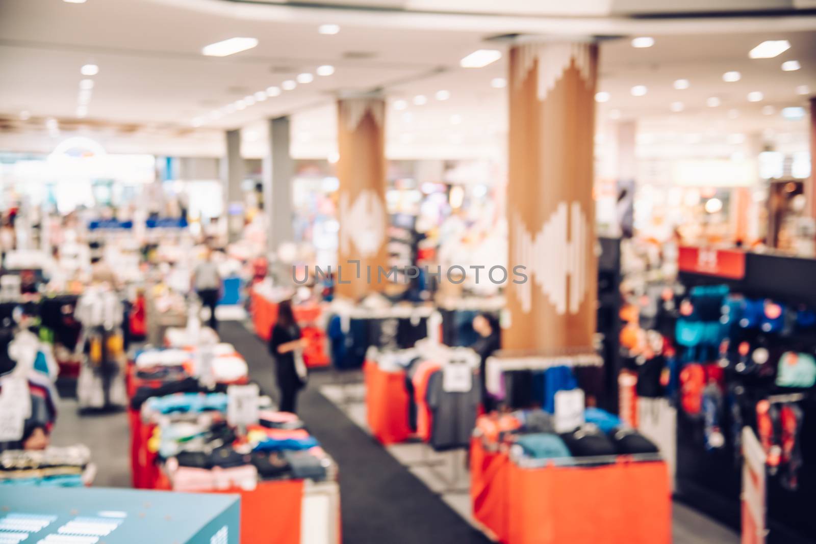 Shopping mall top view blurred indoors with light for lifestyle concept