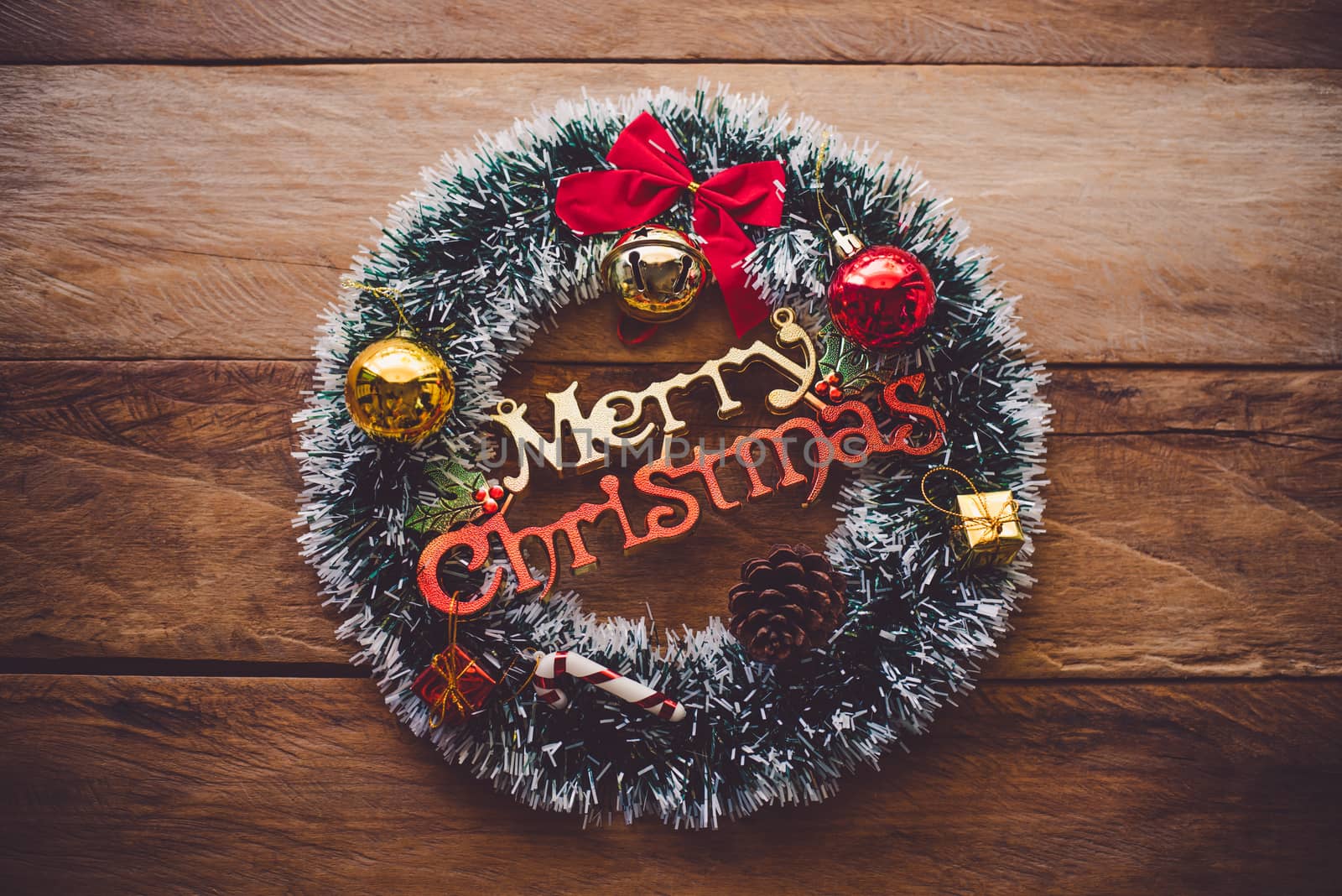 Decorations for Christmas celebrations are placed on wooden floors 
